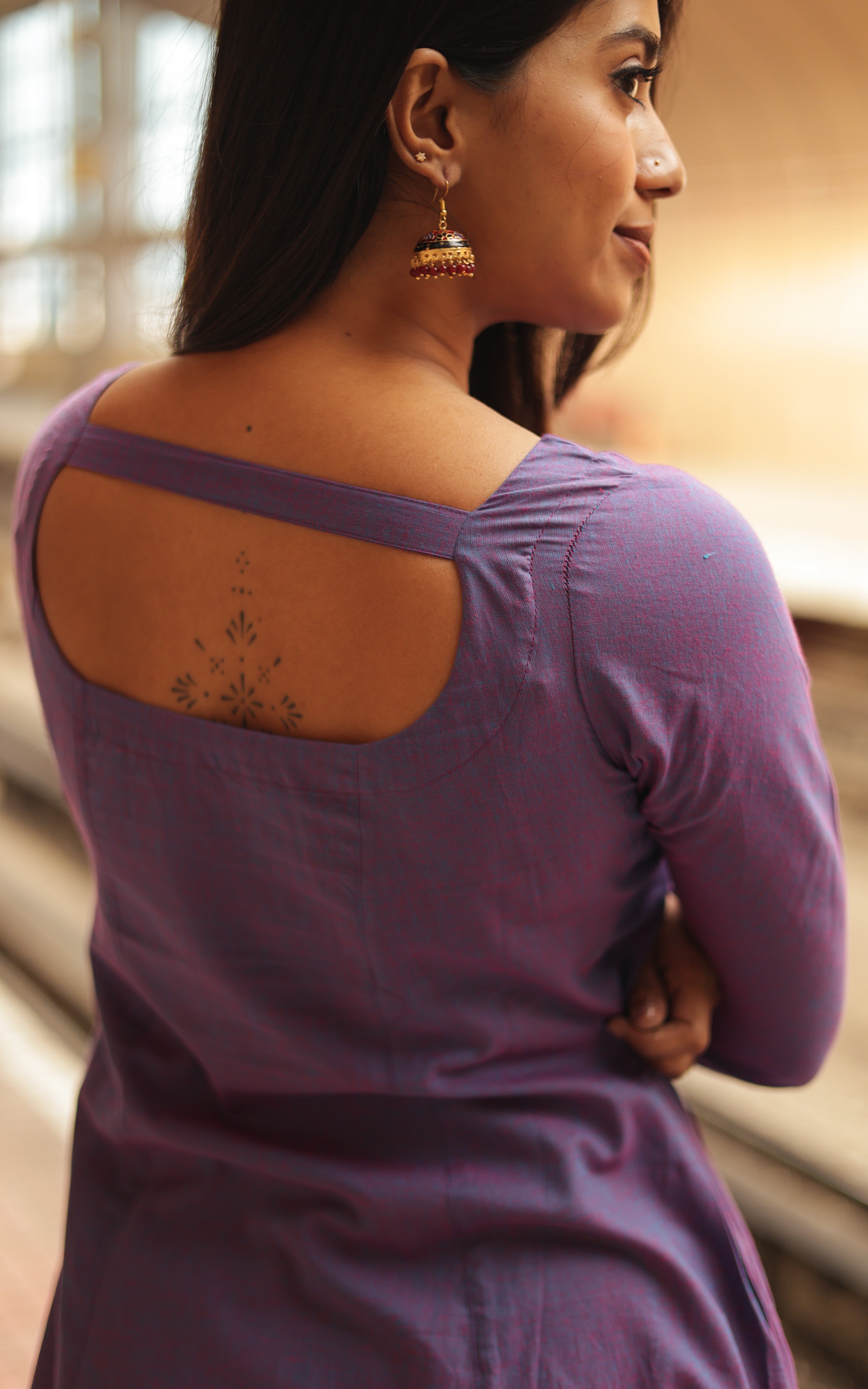 The knot enhances the overall look while providing a flattering and fashionable silhouette