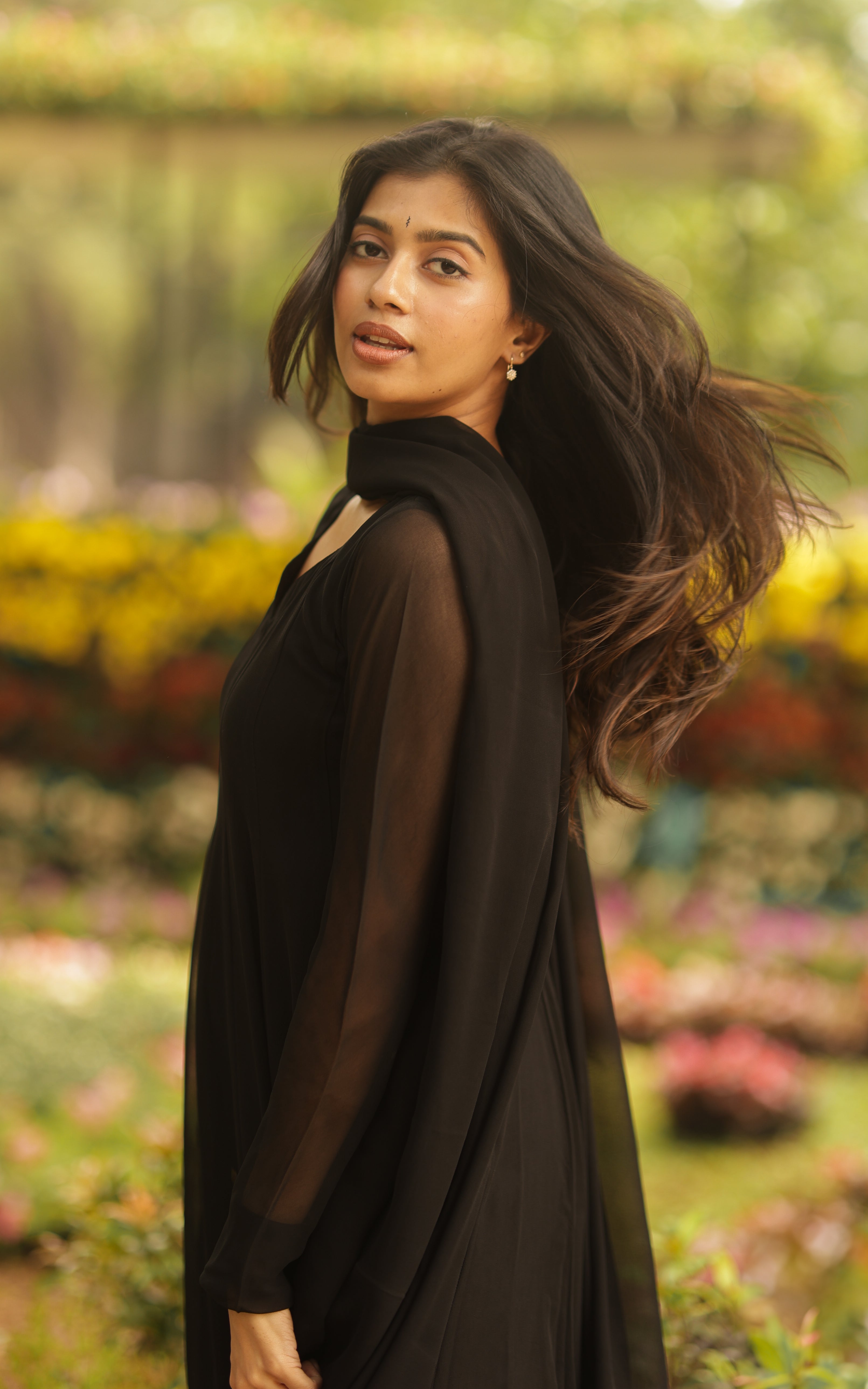 A fashionable black-colored outfit by kadhalar dhinam roja, featuring a sleek and trendy design.