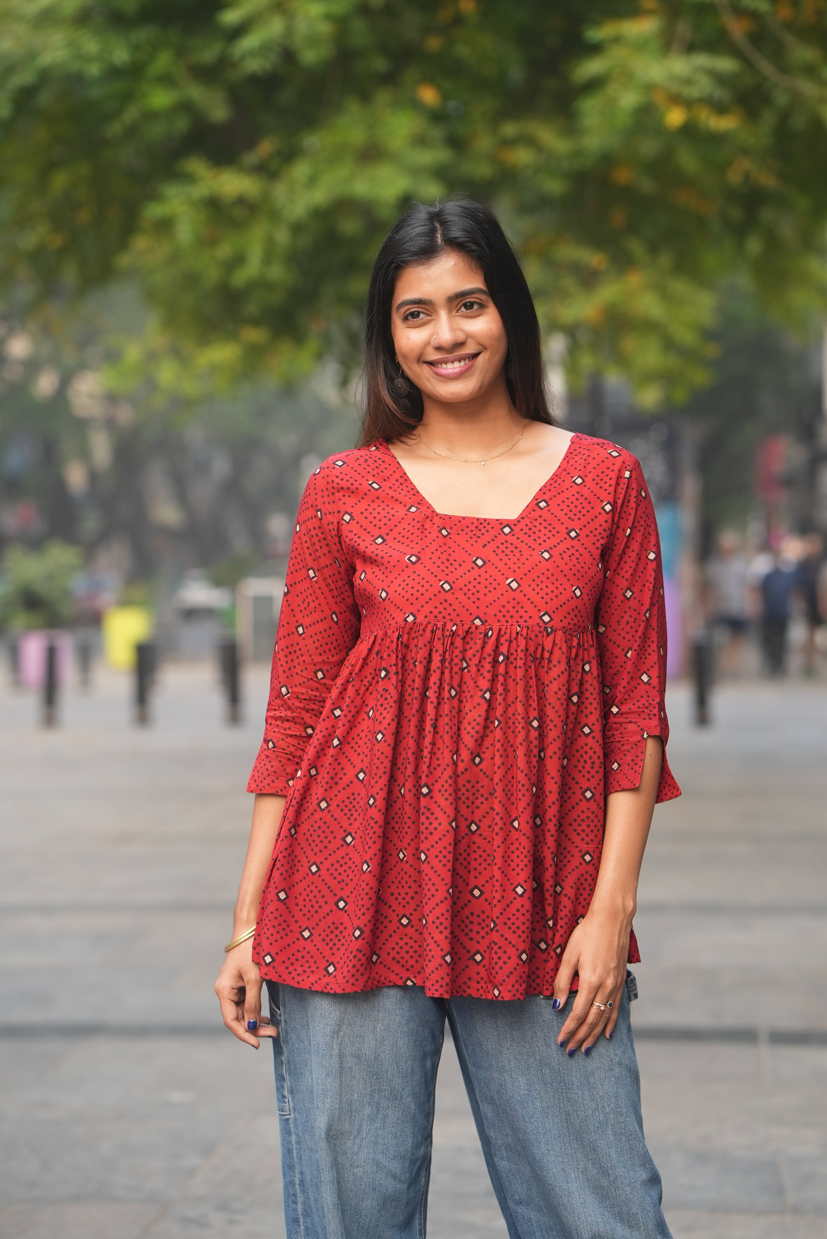 Maroon hand block printed cotton flared A-line short kurti.