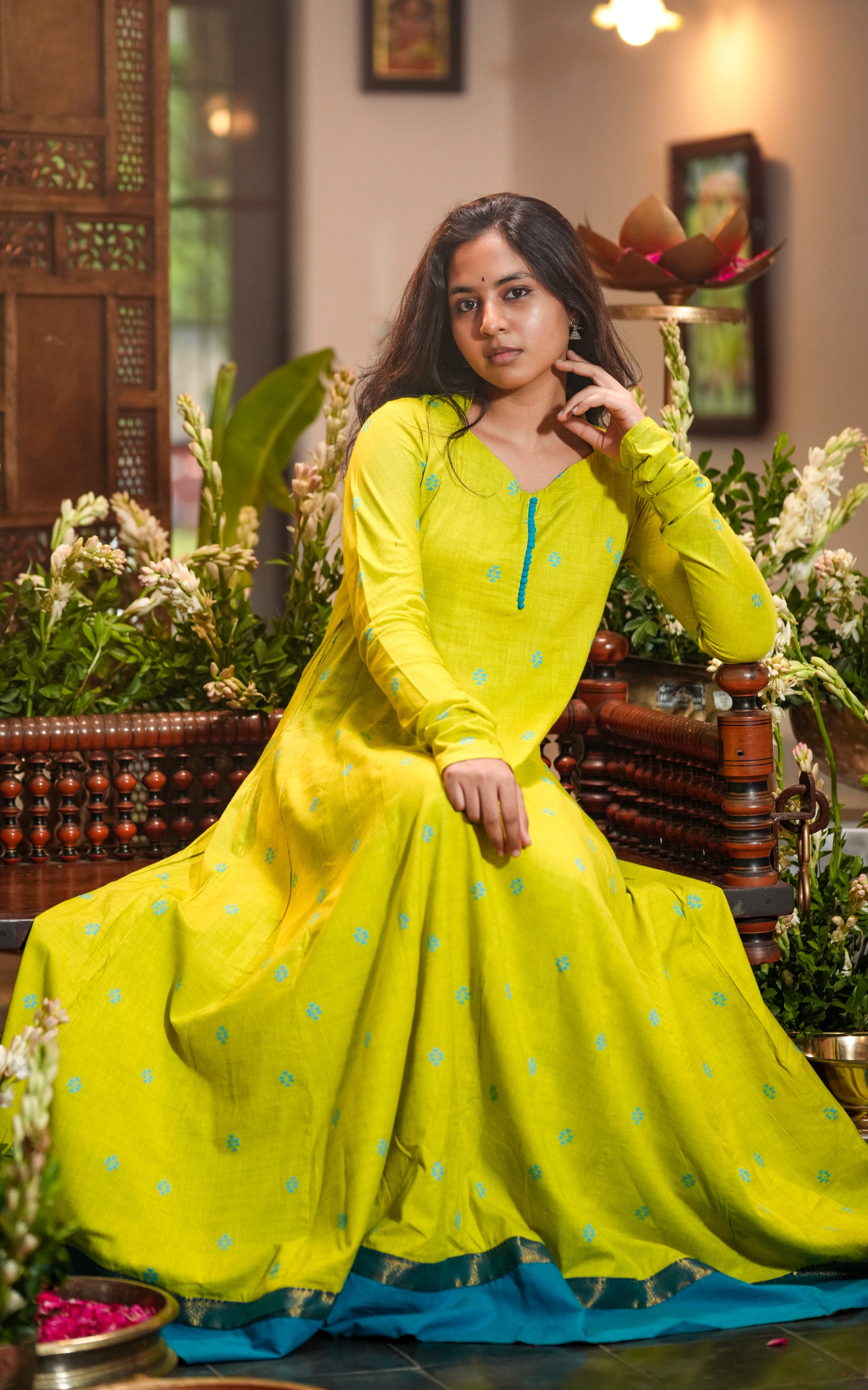 A bold lime green and teal color combination adds a modern twist to a classic style.