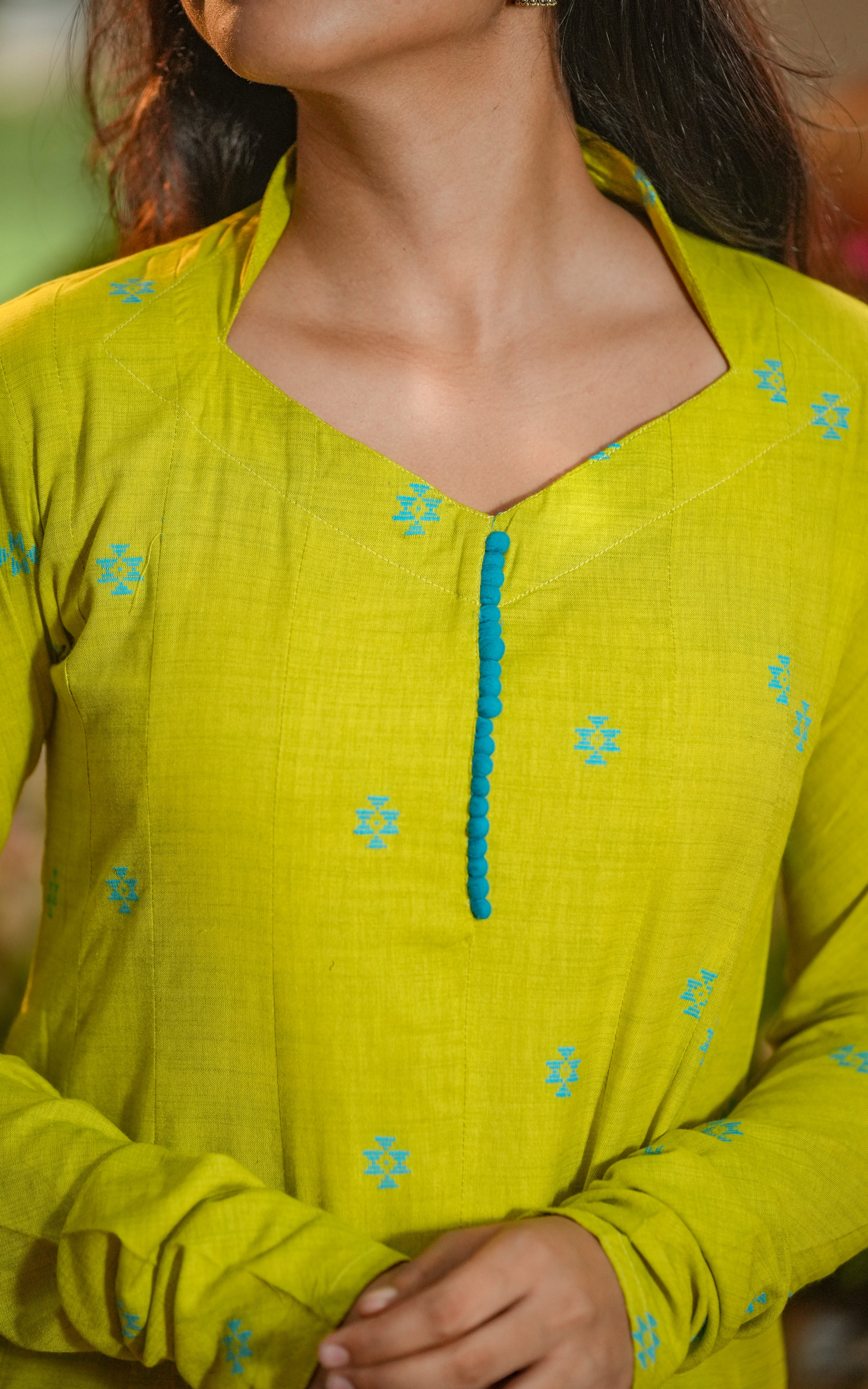 The outfit is styled minimally with no dupatta to let the flare and color speak.