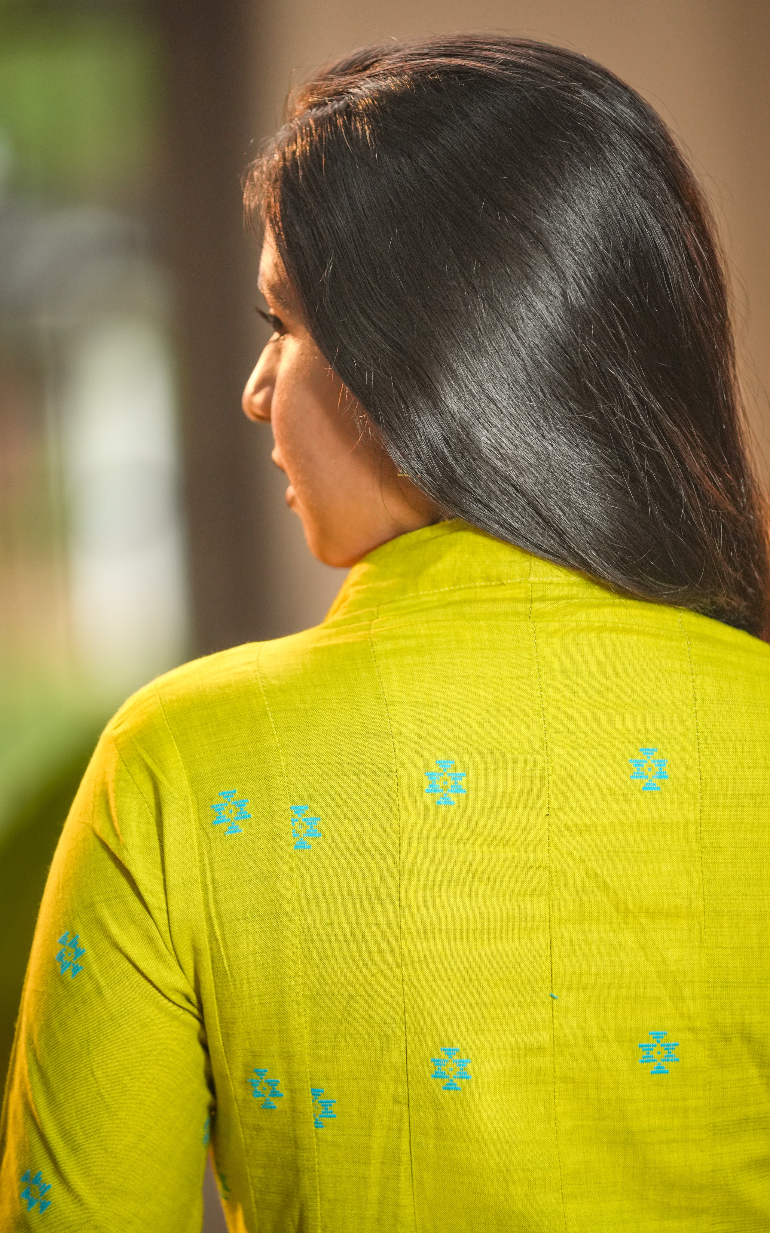 The Anarkali’s flare begins high on the waist, creating a flowy, elegant drape.