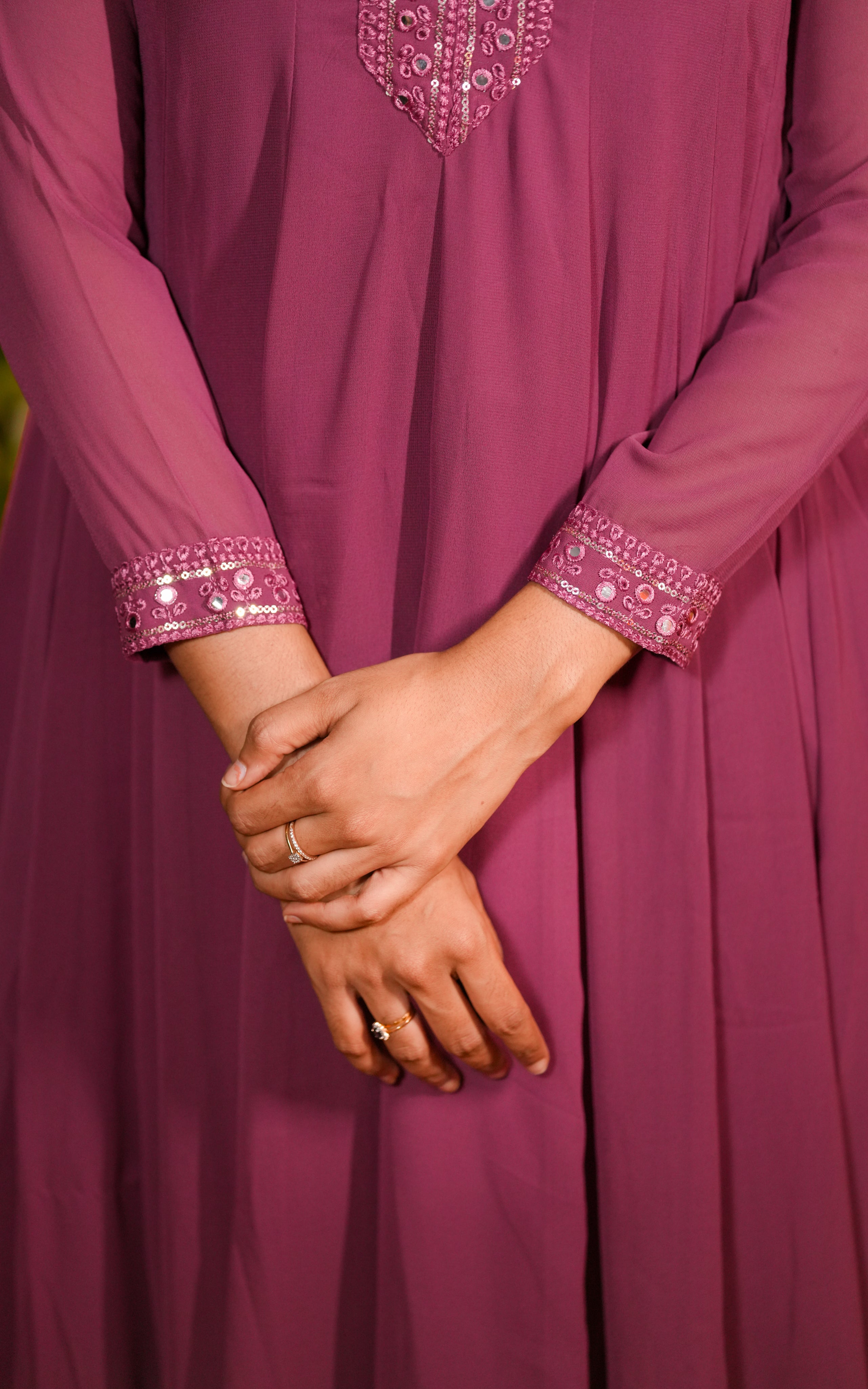 The sleeve transparency adds a soft, feminine touch while keeping it modest.