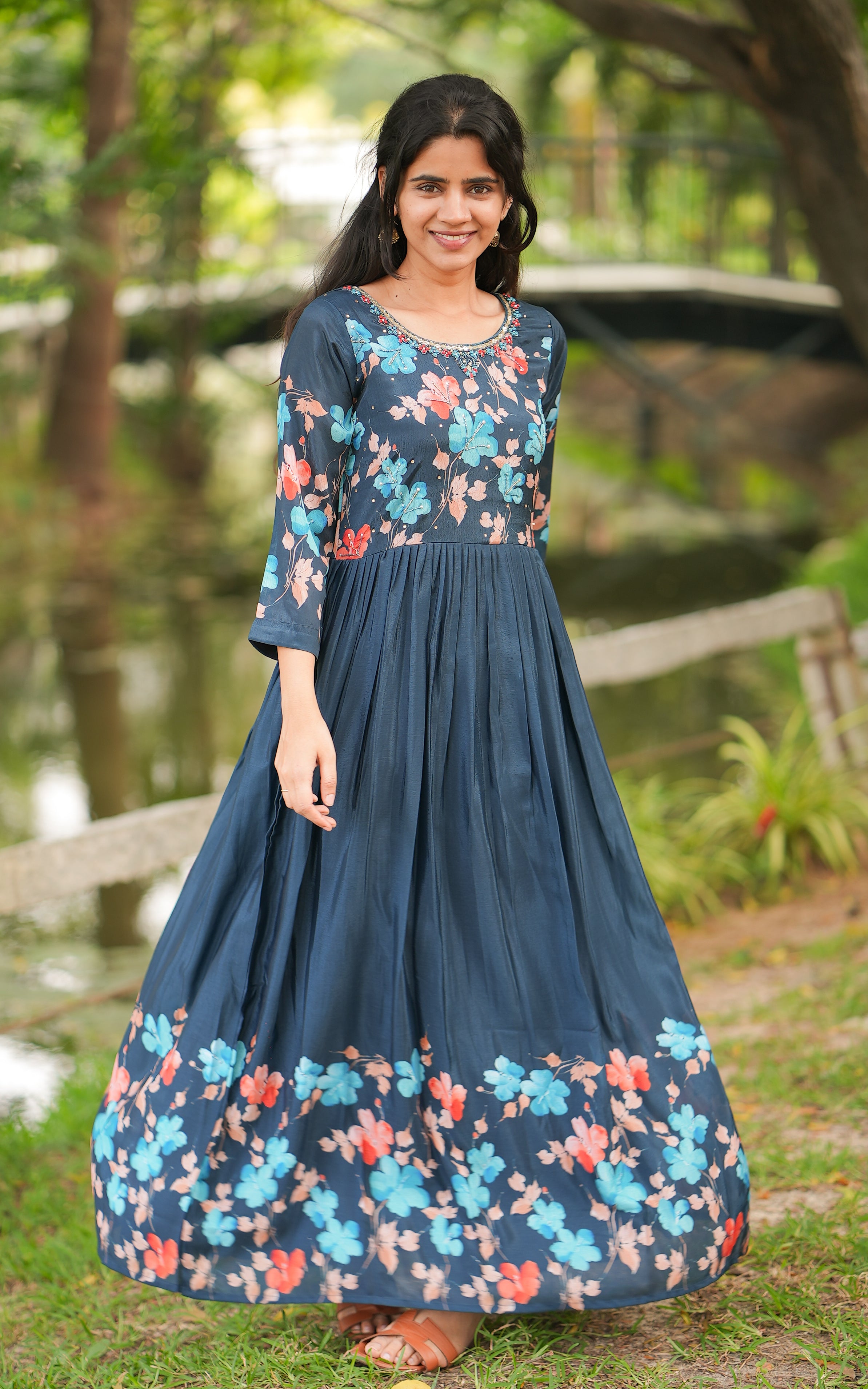Deep, rich navy blue acts as a canvas for the vibrant floral designs.