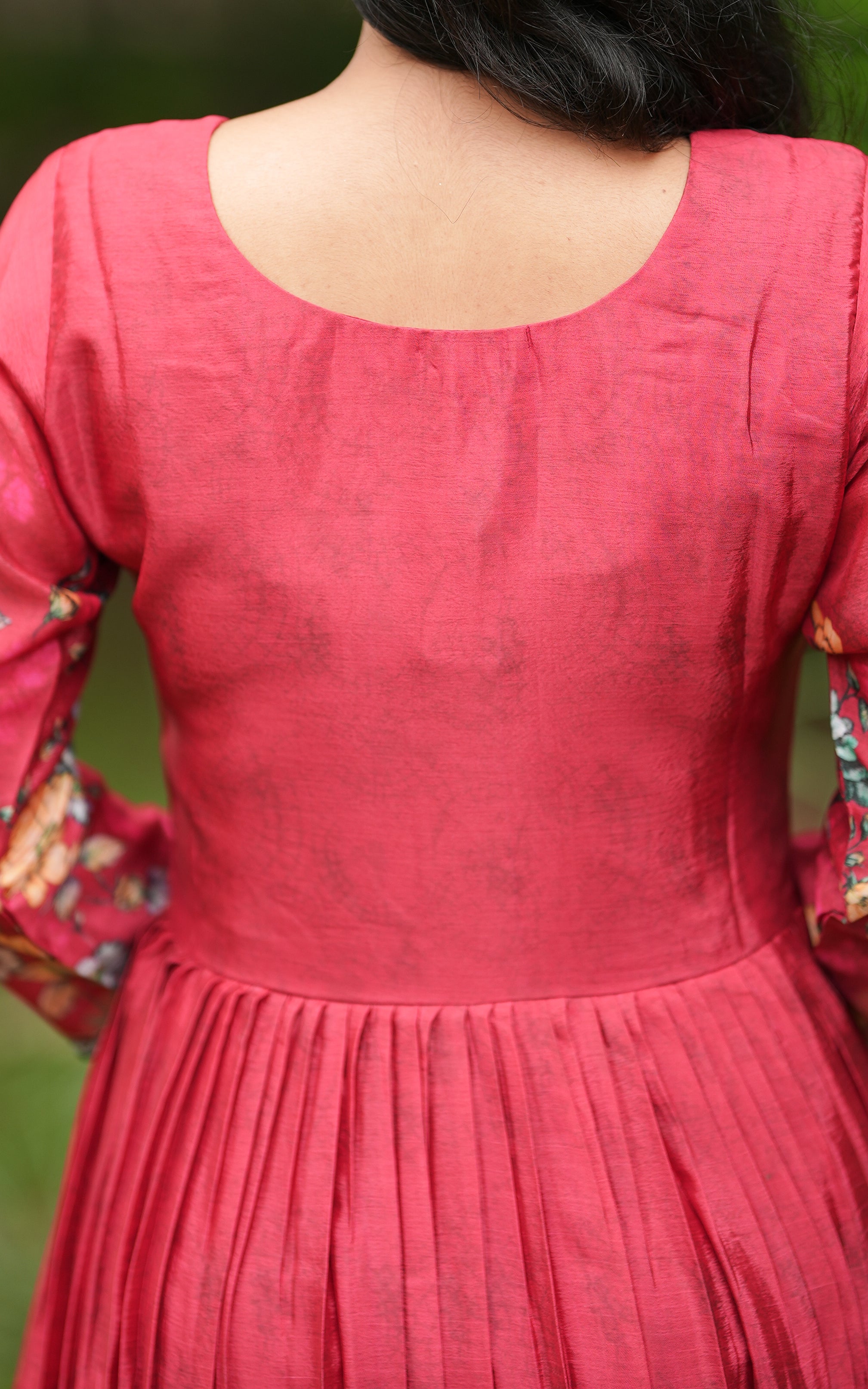 Back neckline features a modest round shape