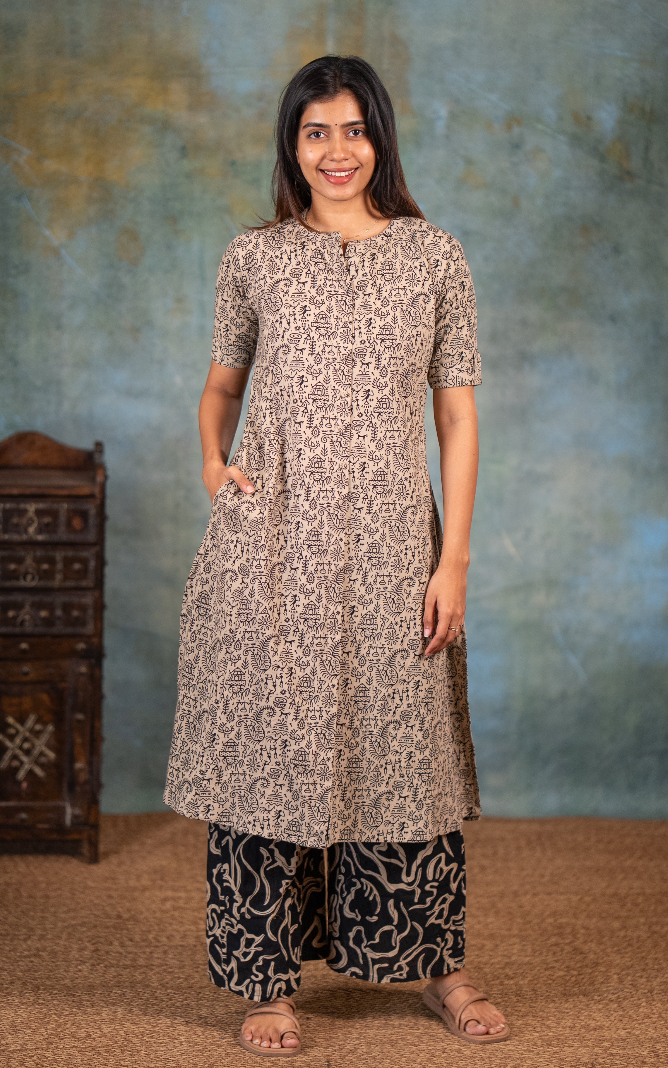 Cotton Kurti Featuring Mandarin Collar With Front And Side Slits