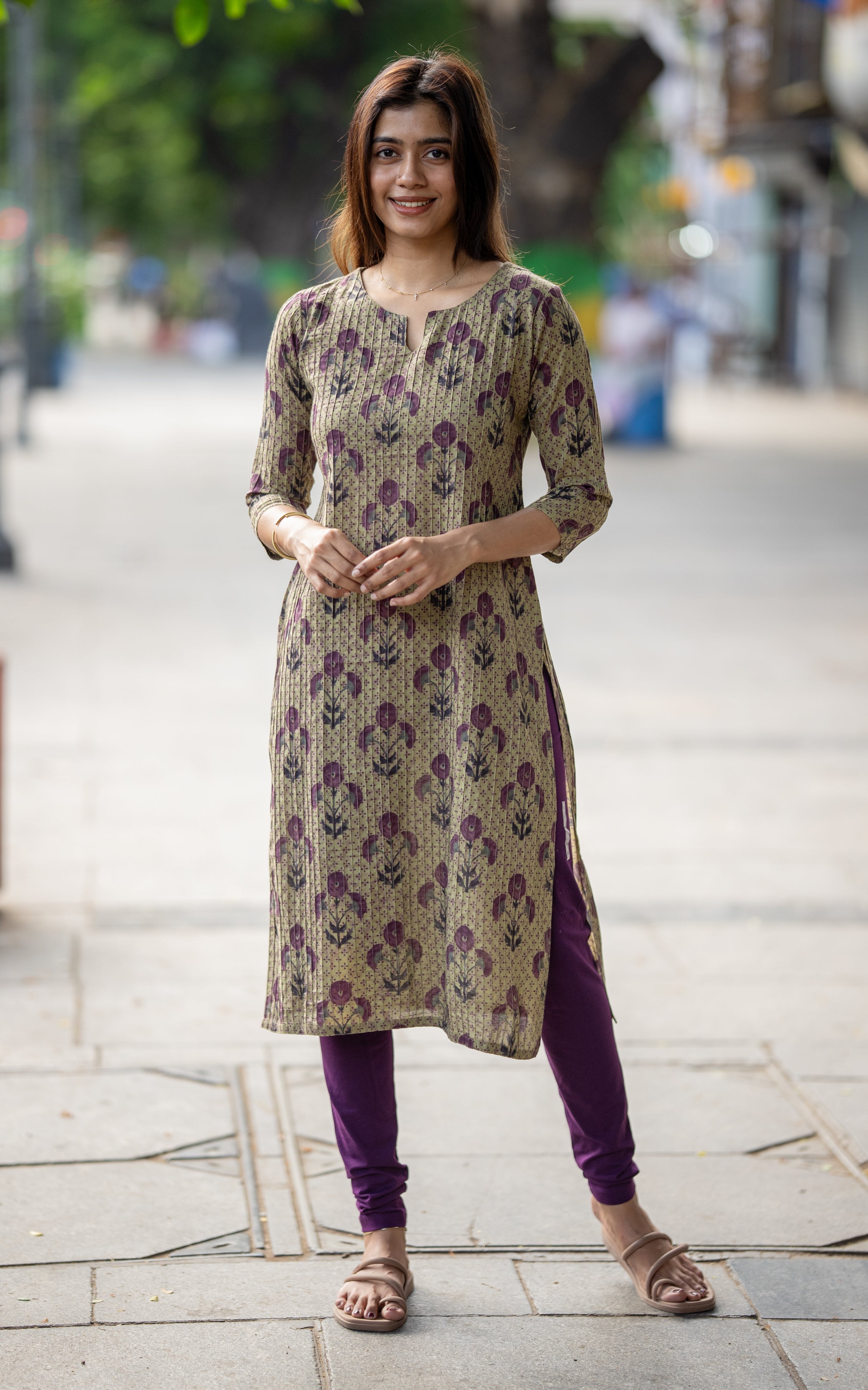 Nisha B