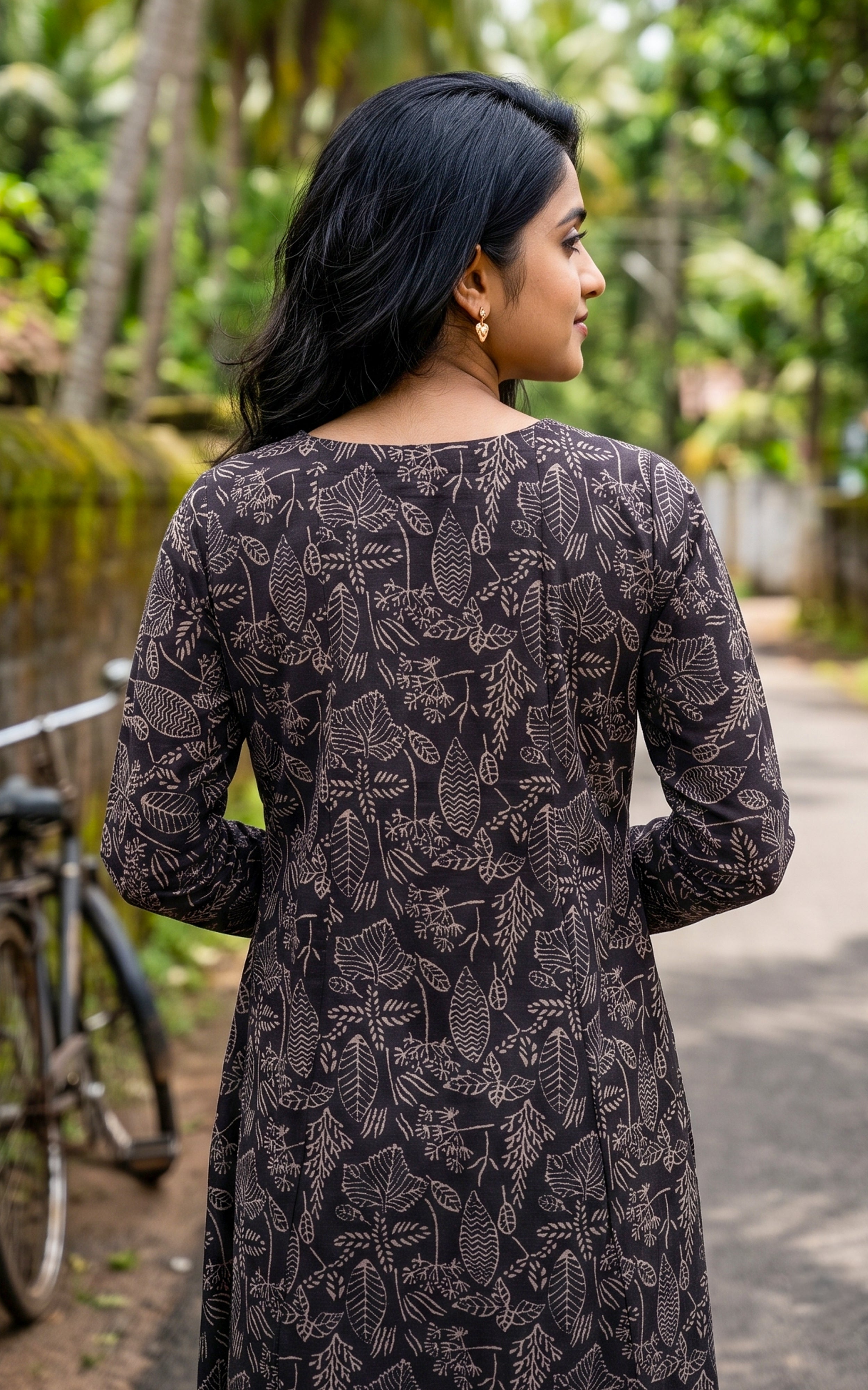 Black Cotton Aline Kurti Featuring Gathered Sleeves for Women