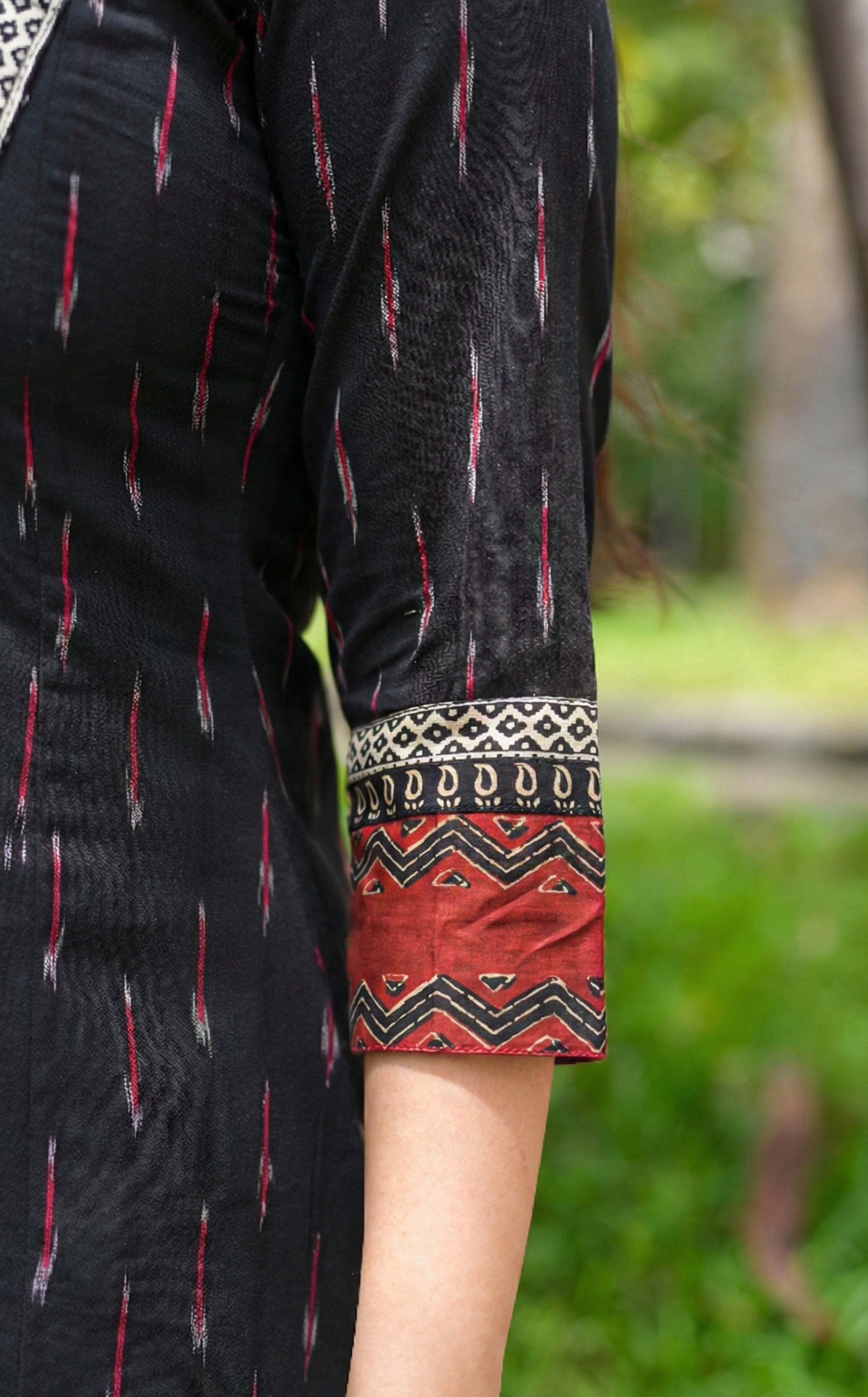 Dharshini Black