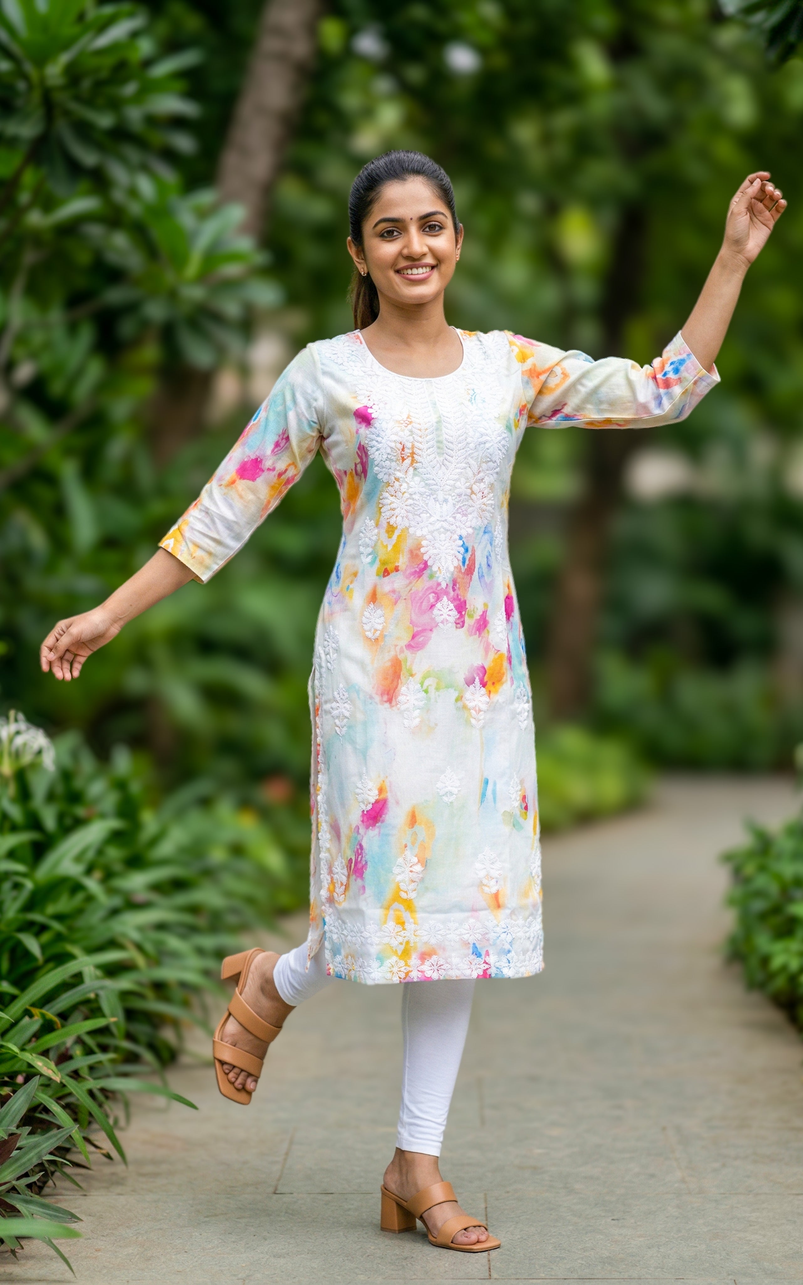 stylish white chikankari kurti for college
trendy cotton kurti with embroidery
modern straight cut kurti with side slit
fashionable cotton kurti for students