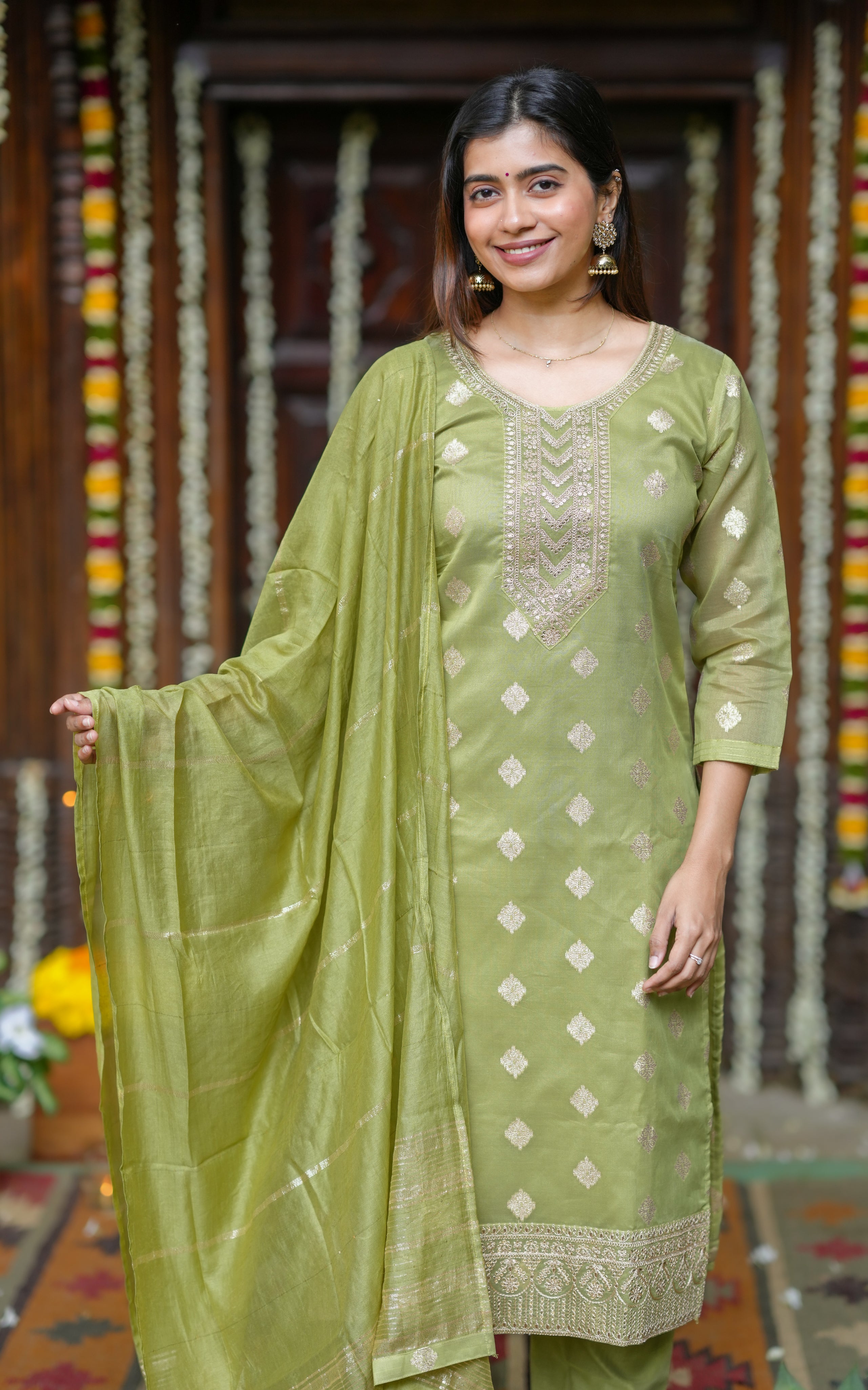 A complete festive look with straight kurti, matching pants, and a beautiful dupatta.