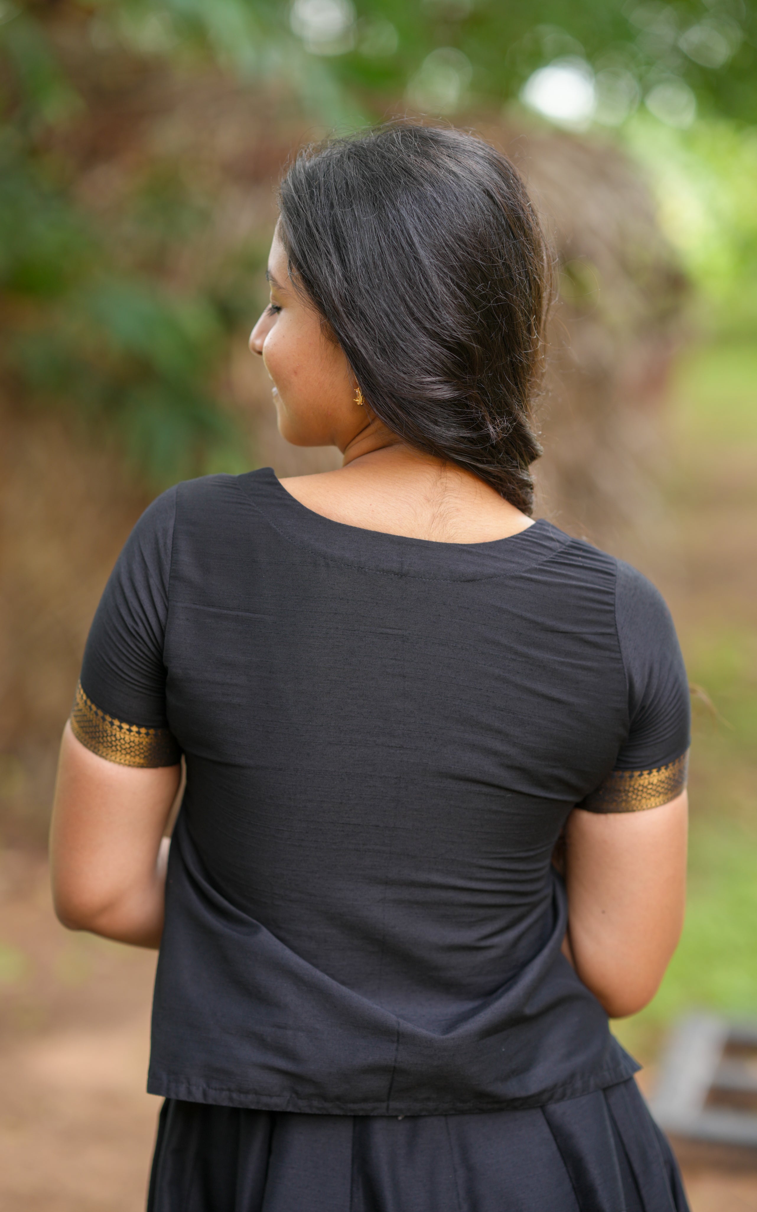 inspired Poorni outfit – ethnic top and flared skirt from Suttri Varum Bhoomi, perfect for a minimal festive look