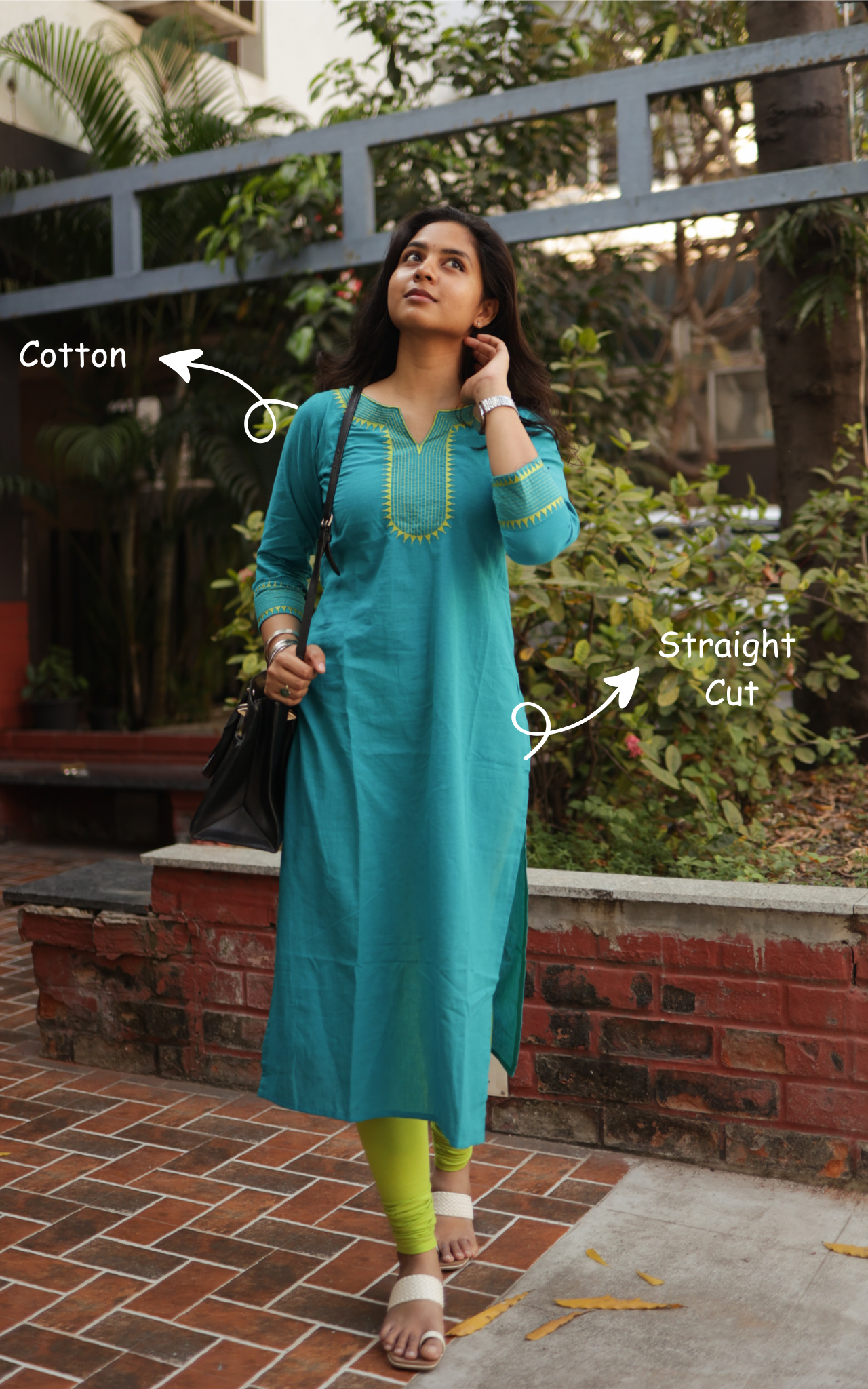 Woman wearing a teal kurta with green pants outdoors, with text indicating 'Cotton' and 'Straight Cut'.