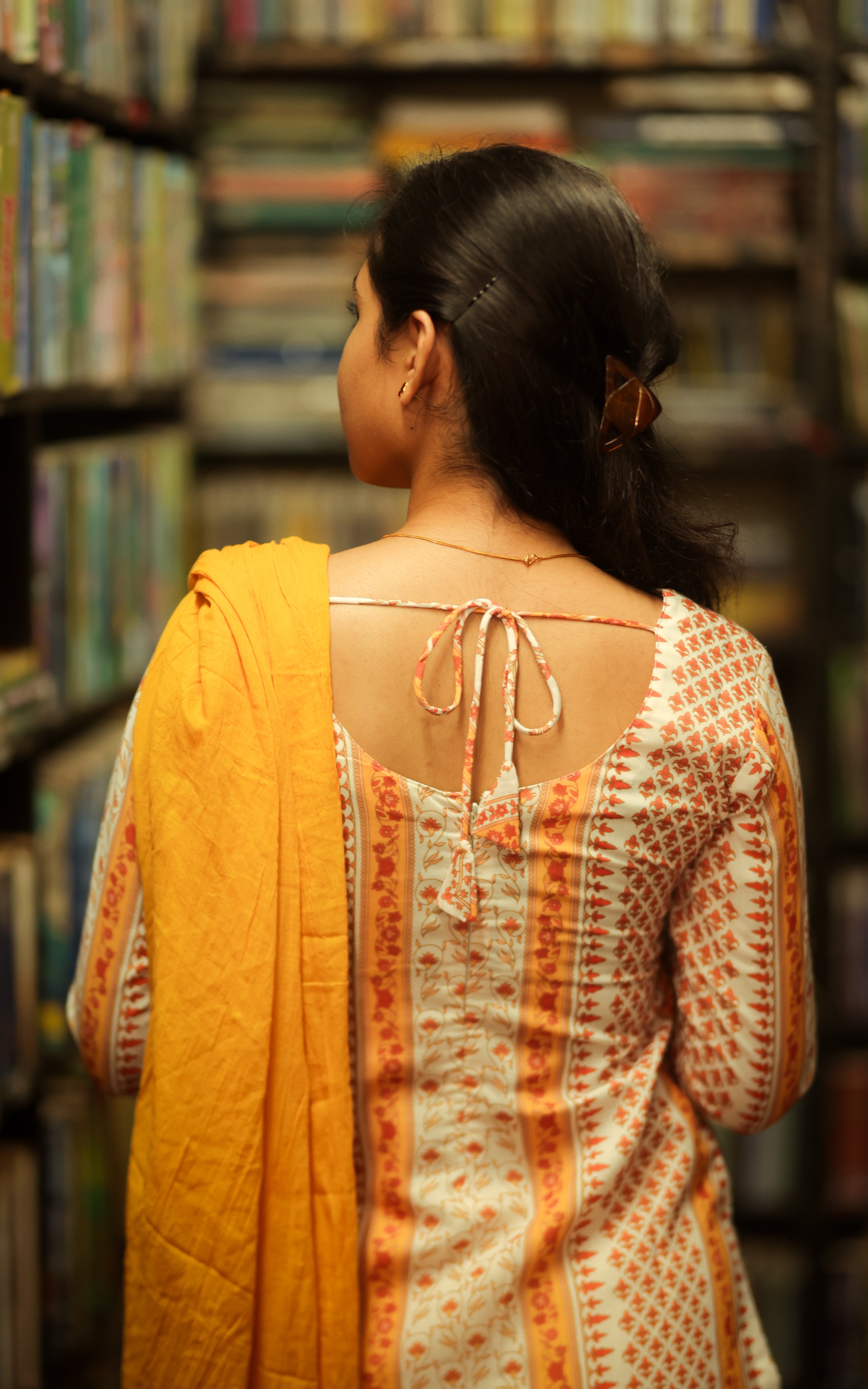 Straight Cut Kurti with U-cut back neck.