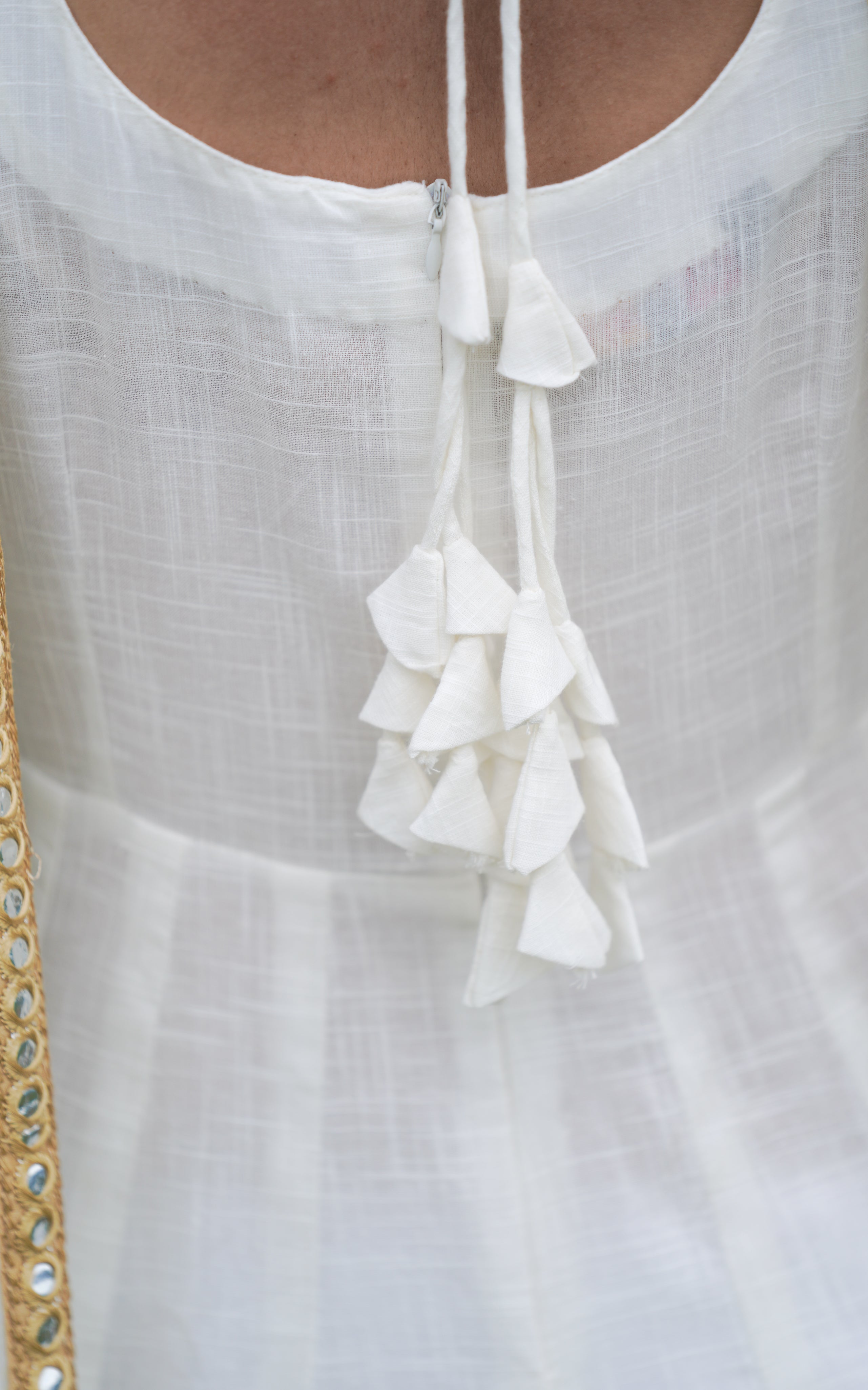 white flowy ethnic dress with plain dupatta, from Raavanan