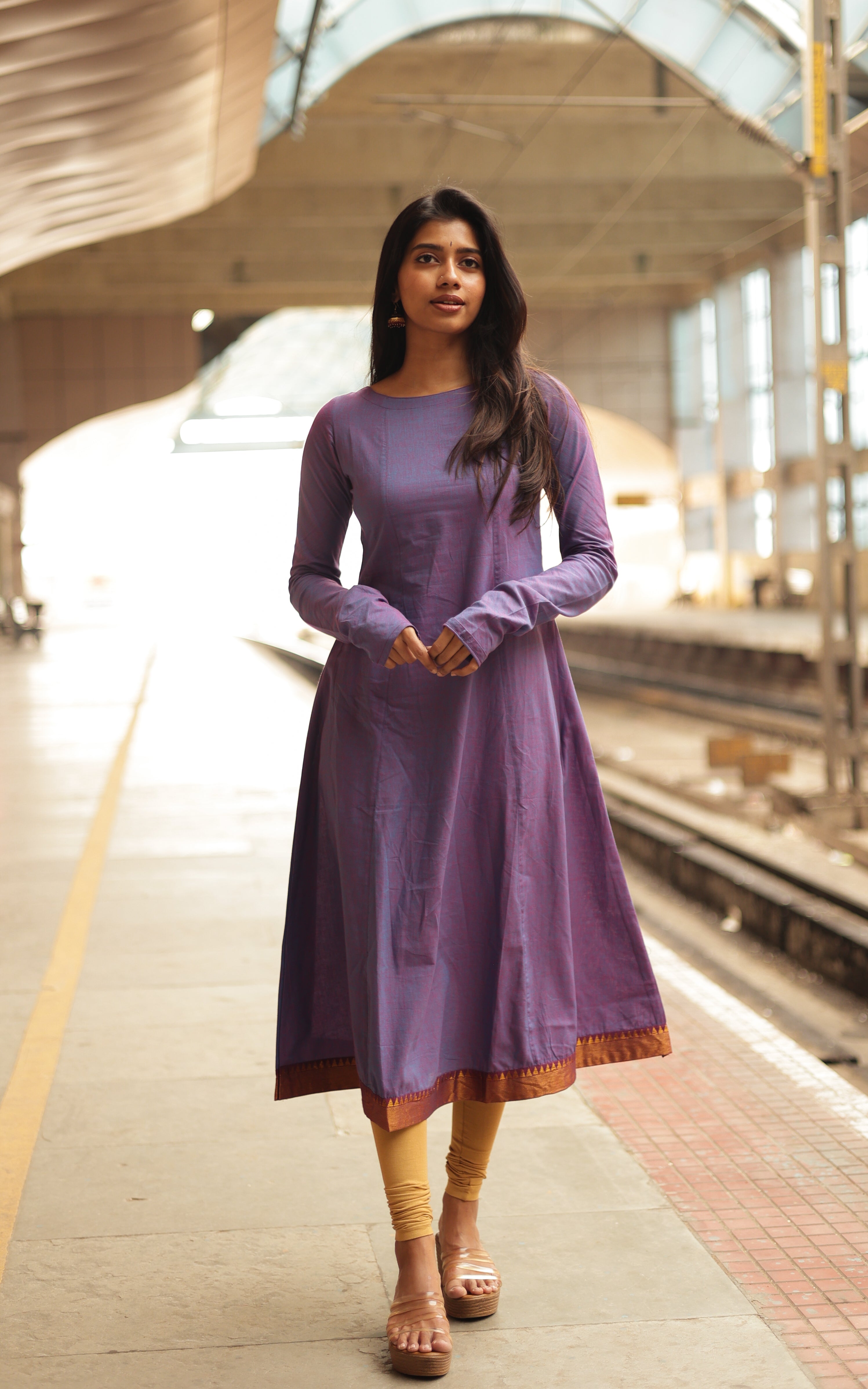 A fashionable dark purple -colored outfit by kadhalar dhinam roja, featuring a sleek and trendy design.