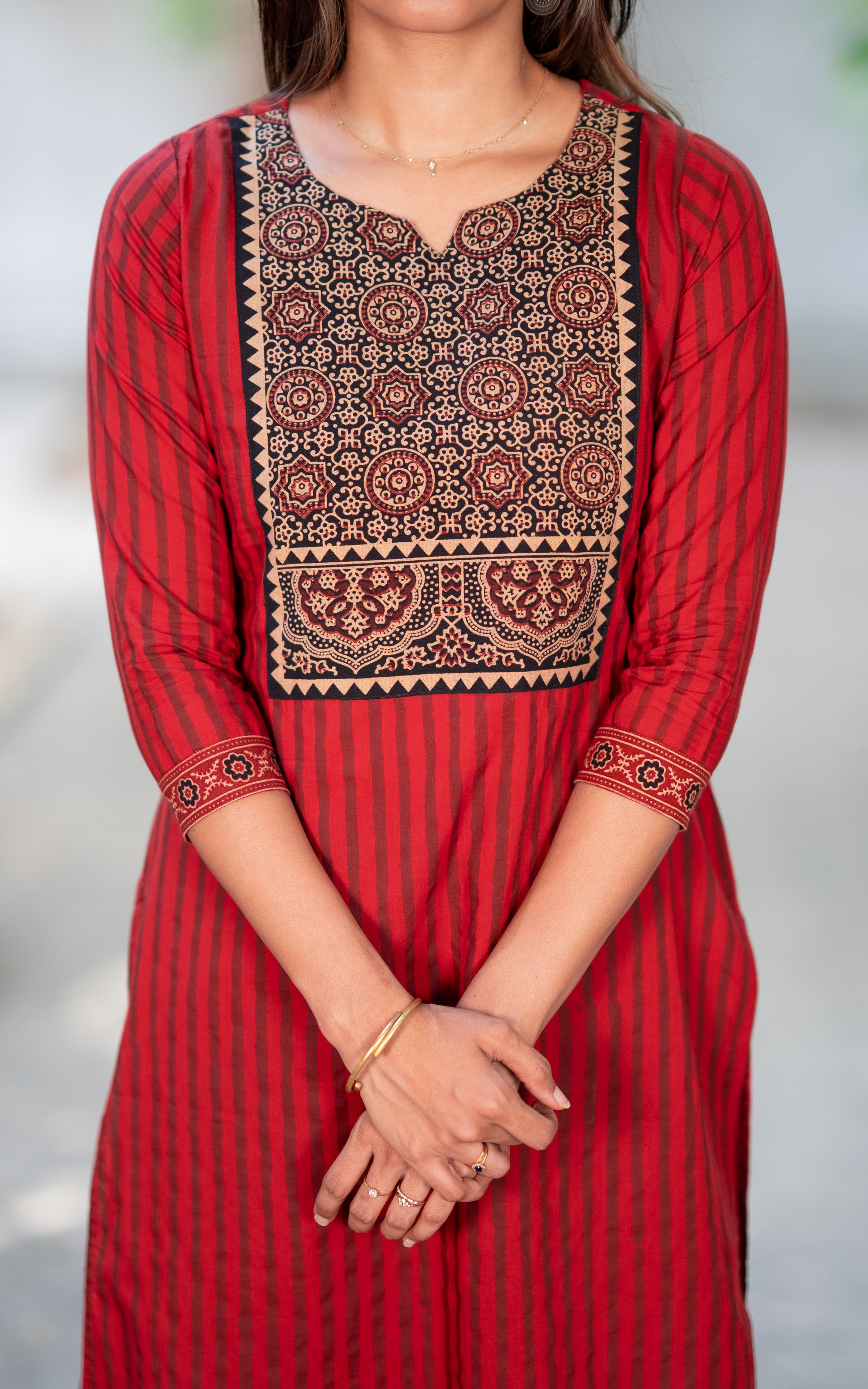 Thalir Maroon