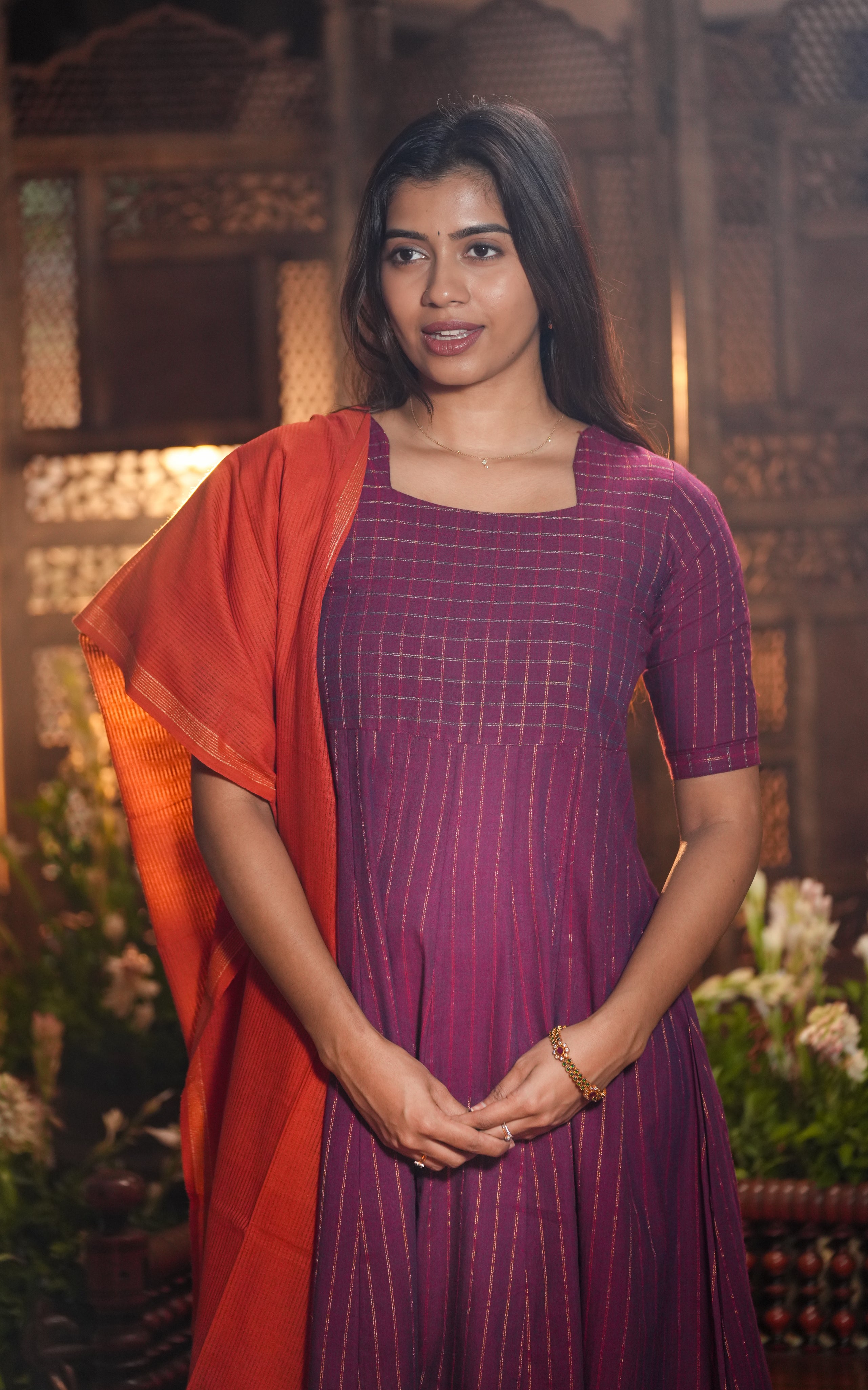 A handcrafted Anarkali that blends bold colors and traditional textures beautifully.