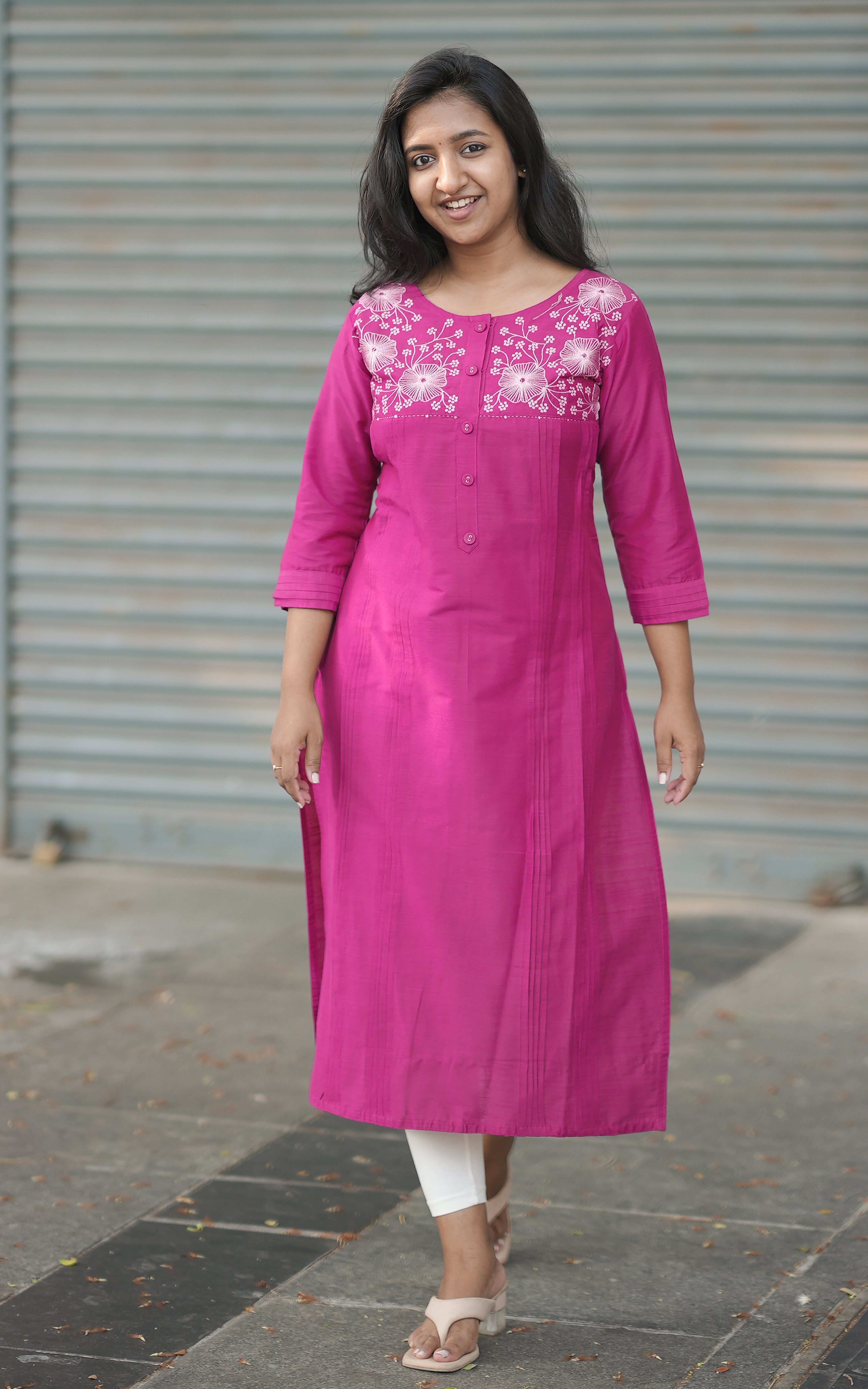 pink kurti with white embroider