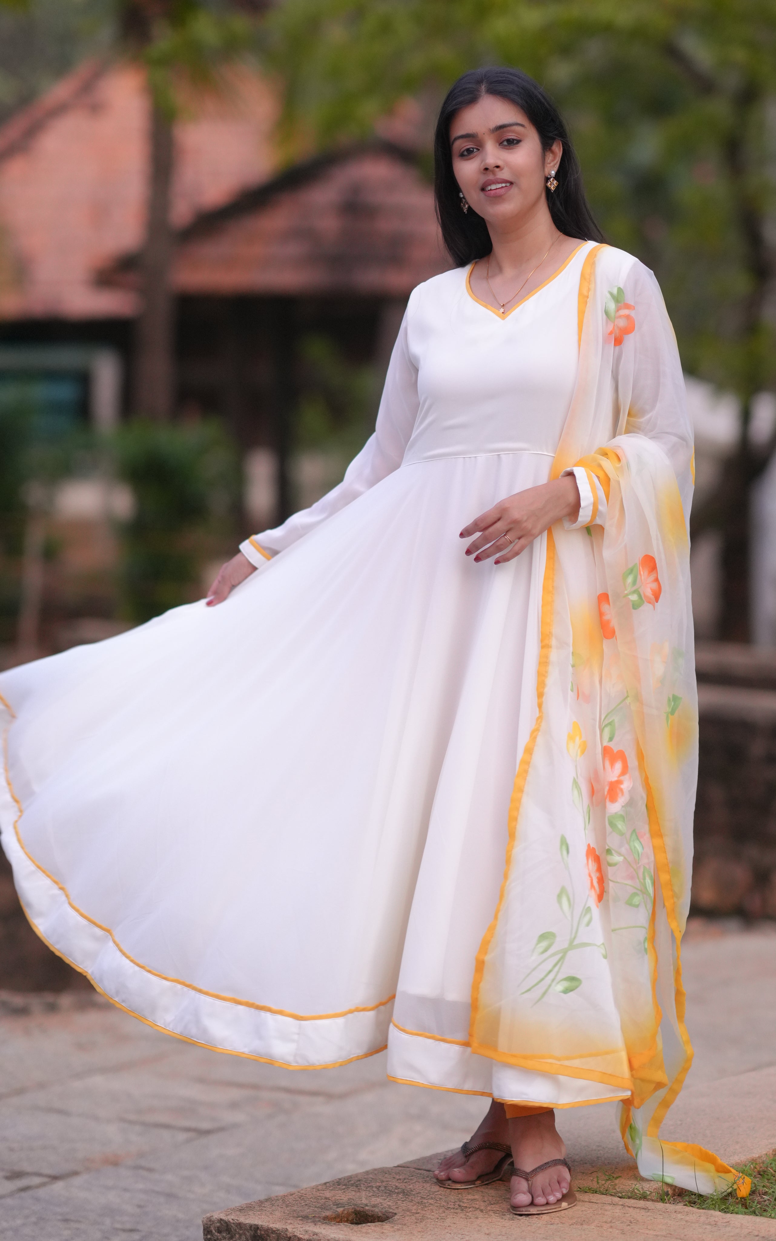 Flared Anarkali silhouette for graceful twirl & Elegant V-neck design