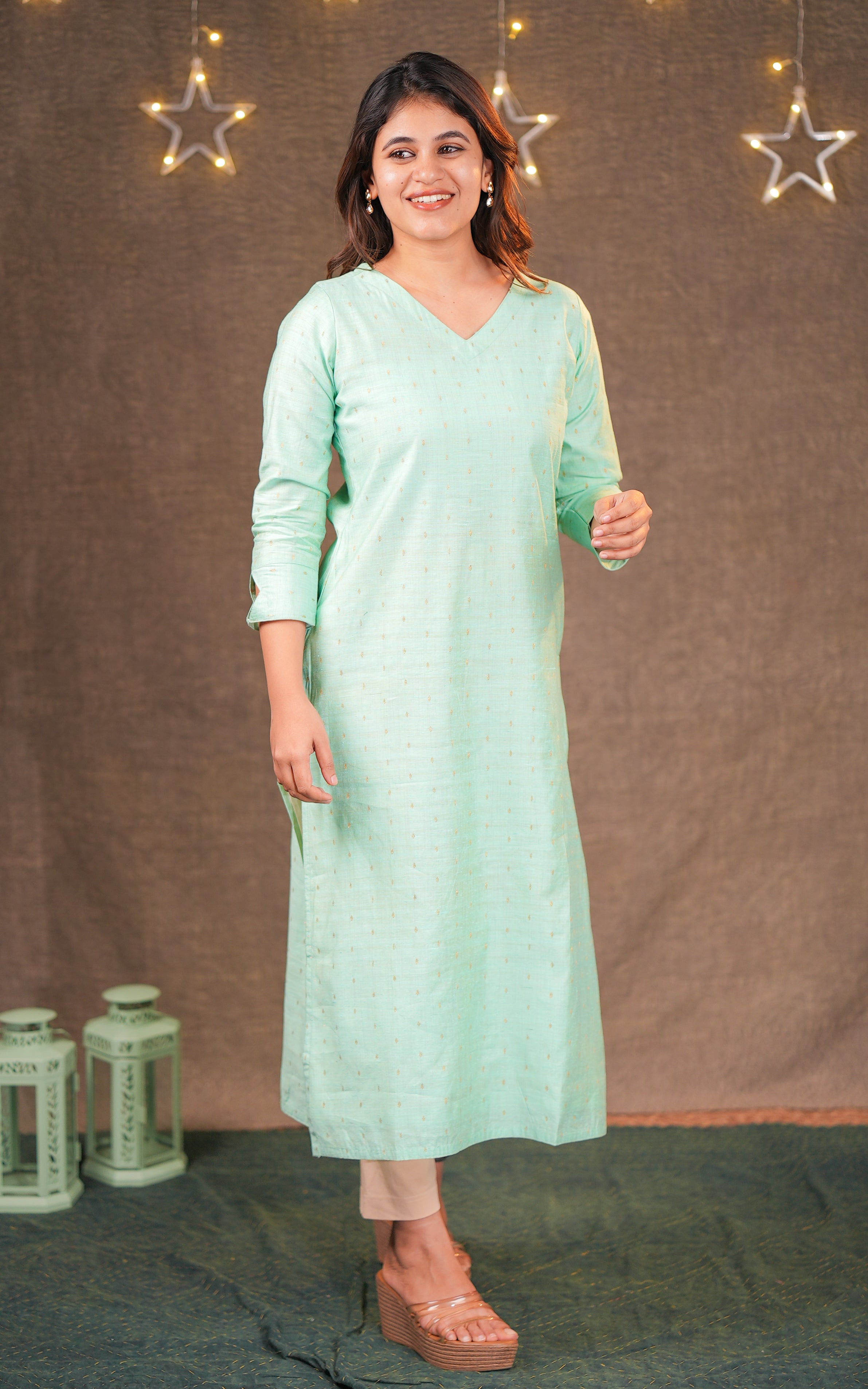 Instore - Pastel Green Color Silk Cotton V-Neck Straight Cut Kurti with Side Slits, & Golden Zari Butta & Butter Crepe Lining