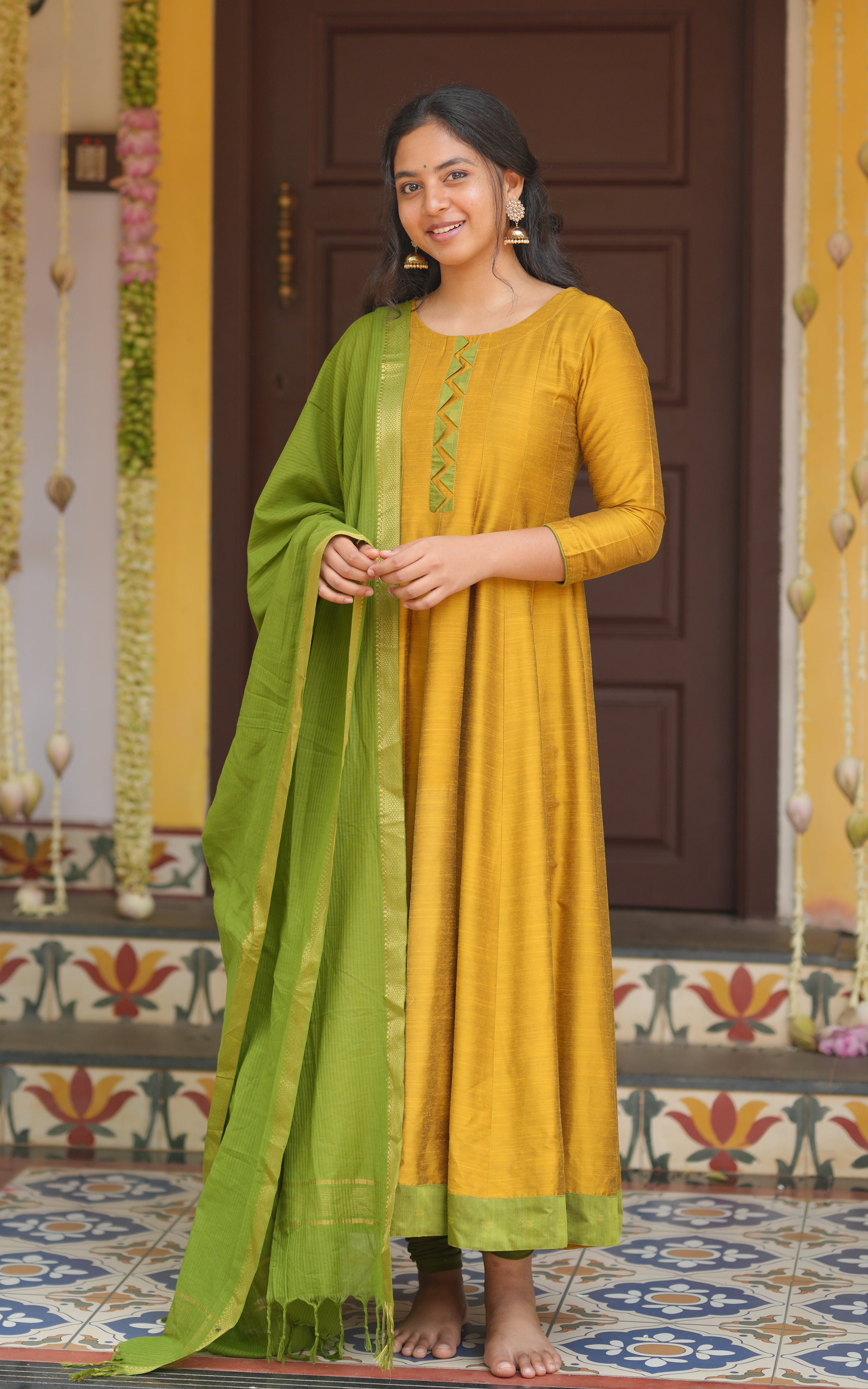 Anarkali kurti with gold sari
