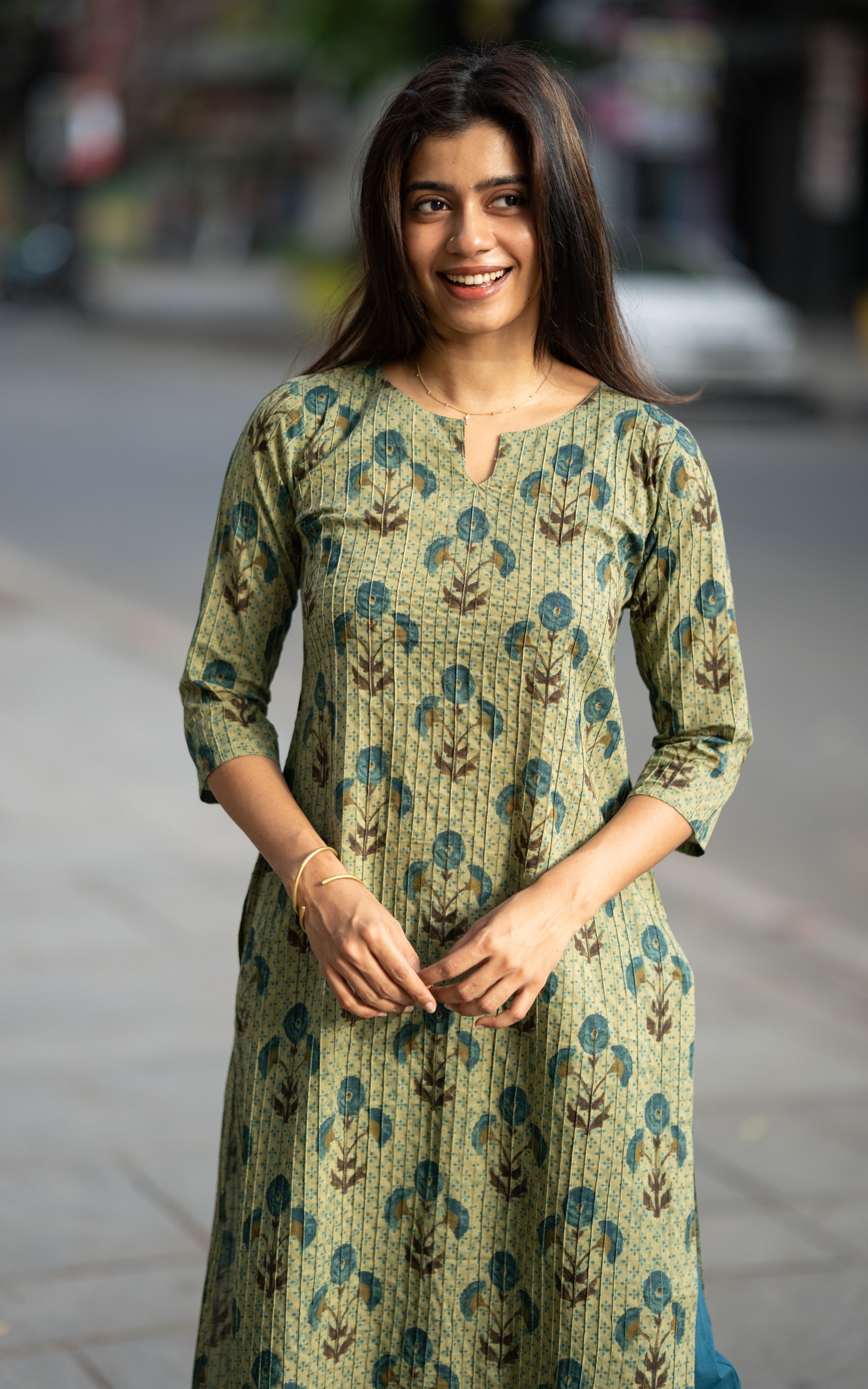 Nisha A