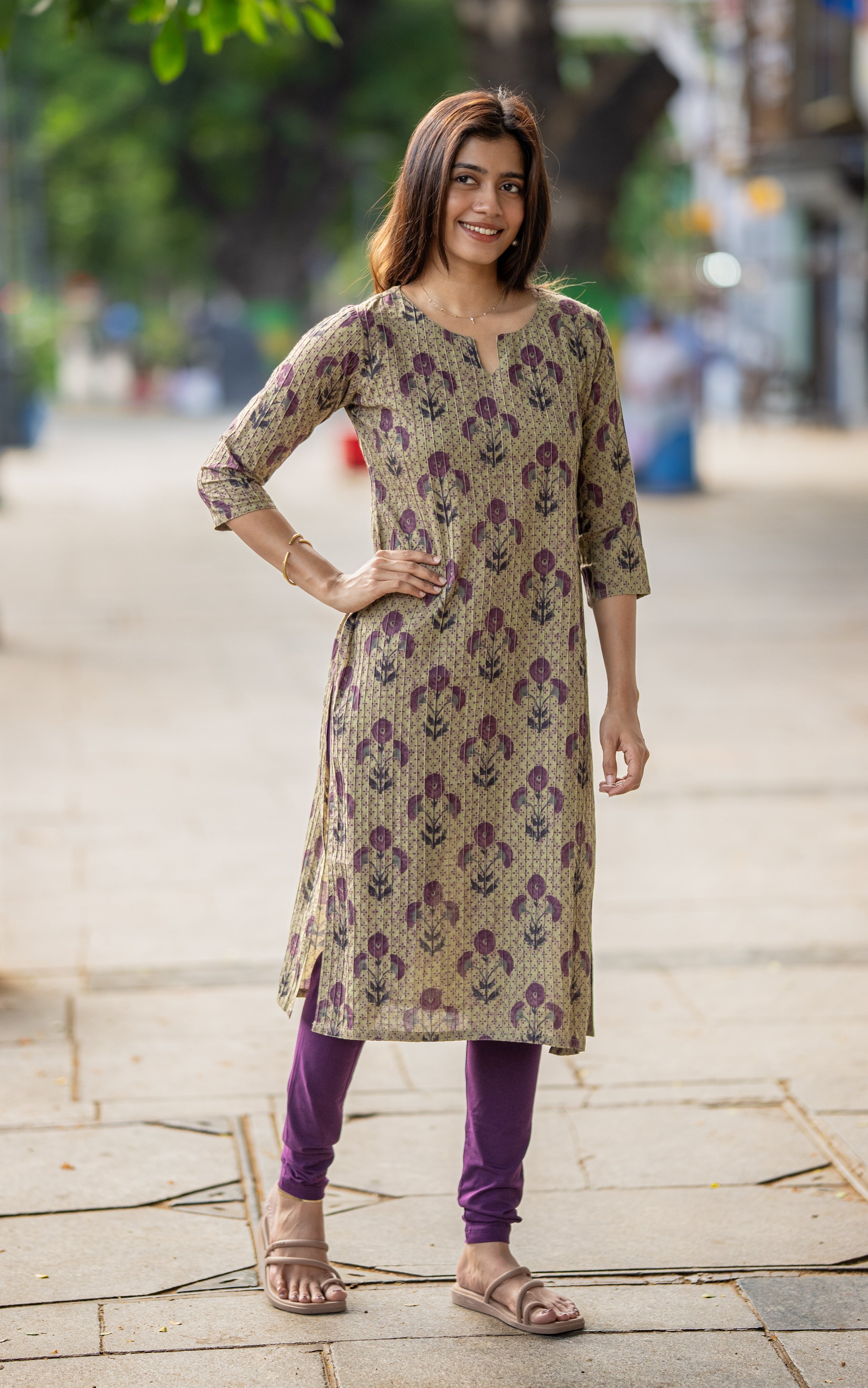 Nisha B
