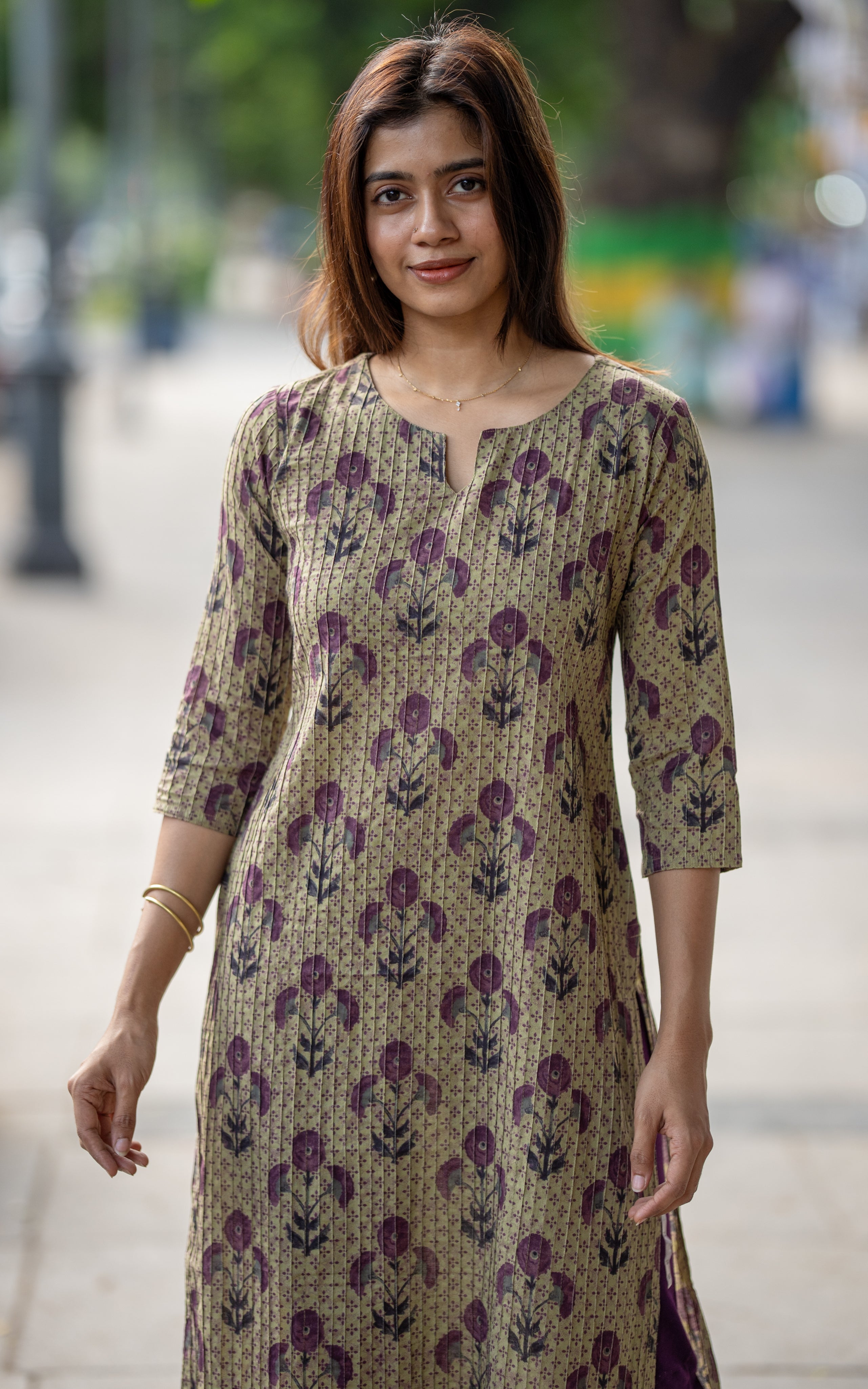 Nisha B