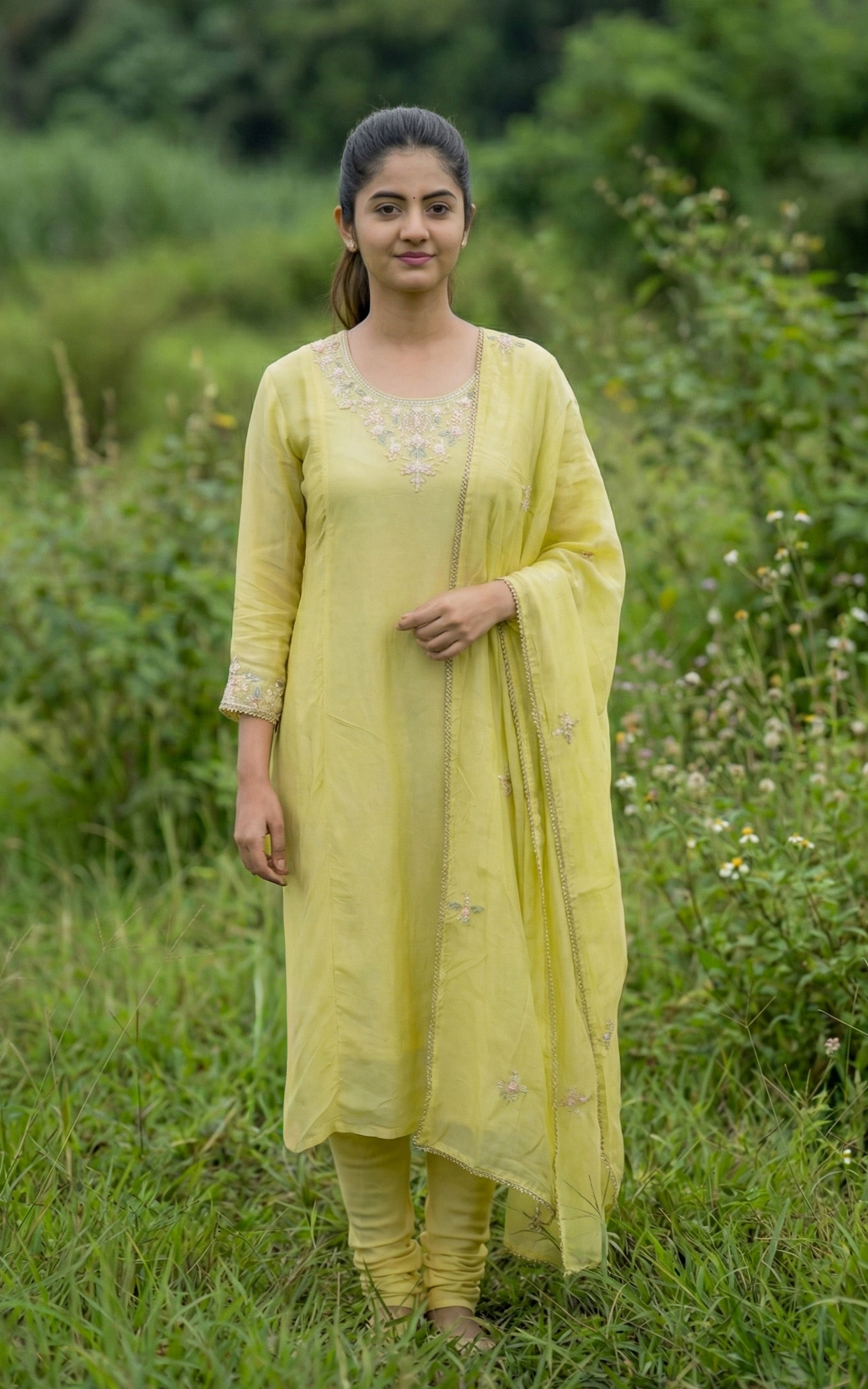 Woman in a yellow traditional outfit 