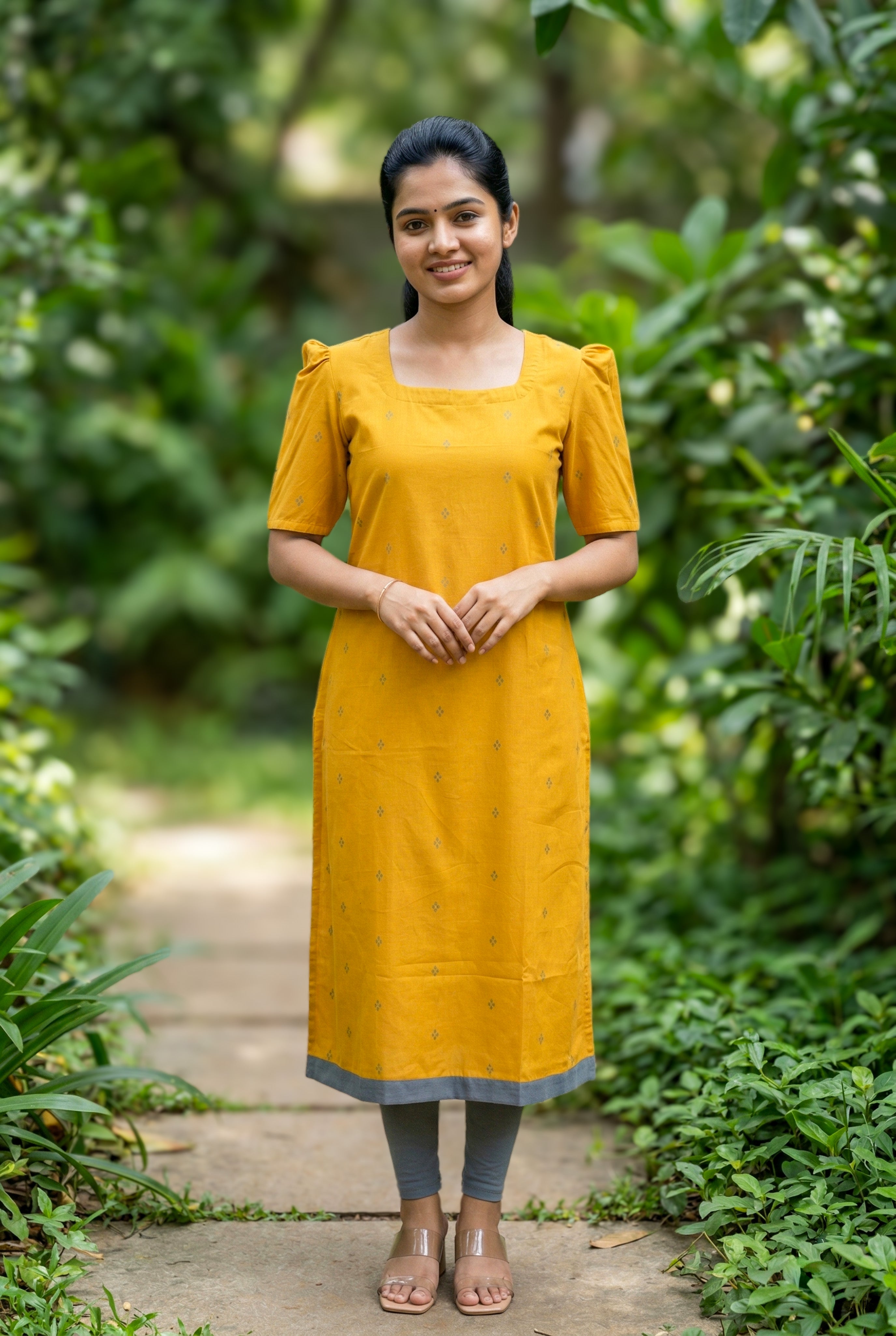 stylish mustard cotton kurti for college
trendy straight cut kurti with puff sleeves
modern casual south cotton kurti
fashionable cotton kurti with side slit