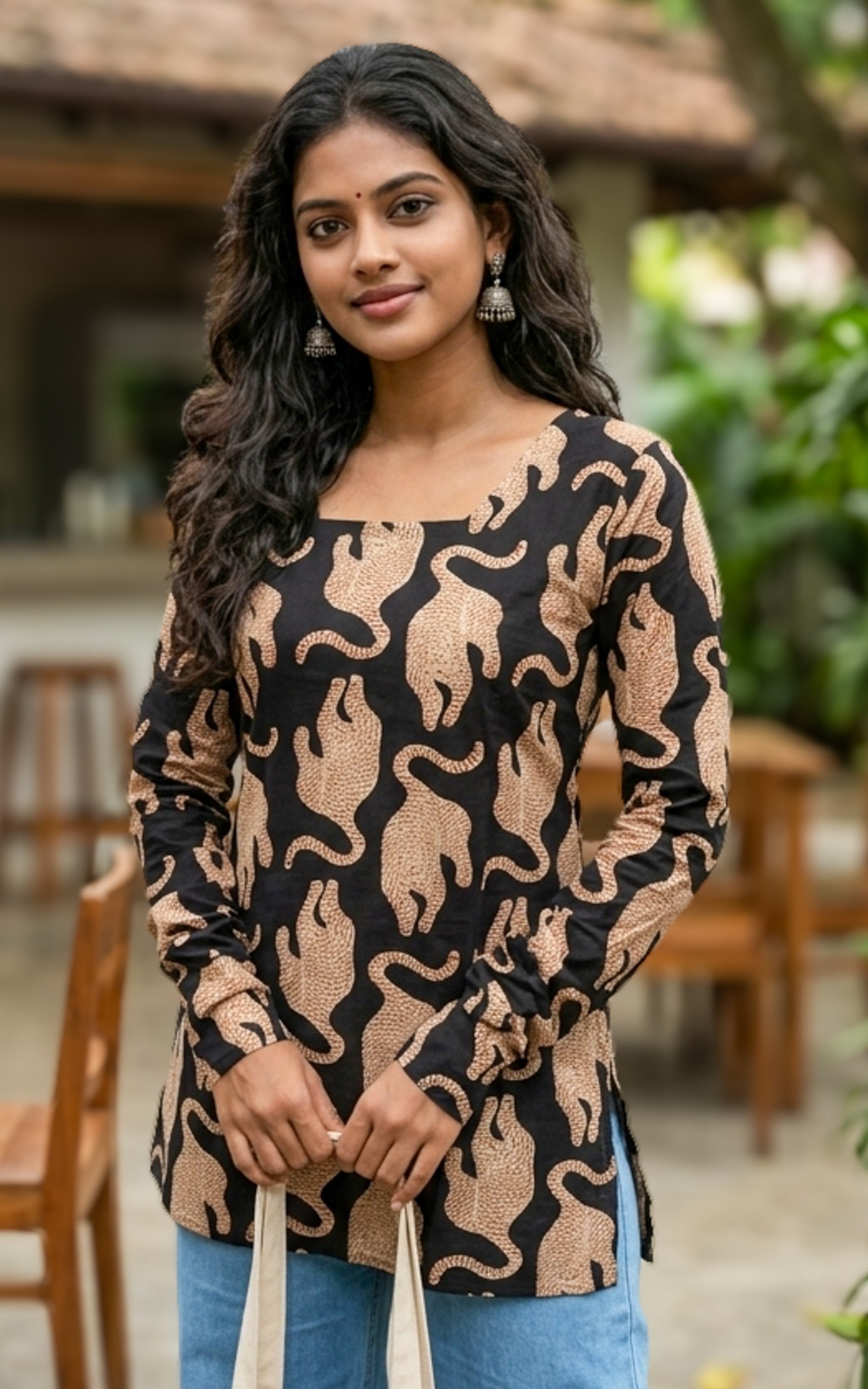 Cotton kurti with criss cross back design

Straight cut short kurti for women