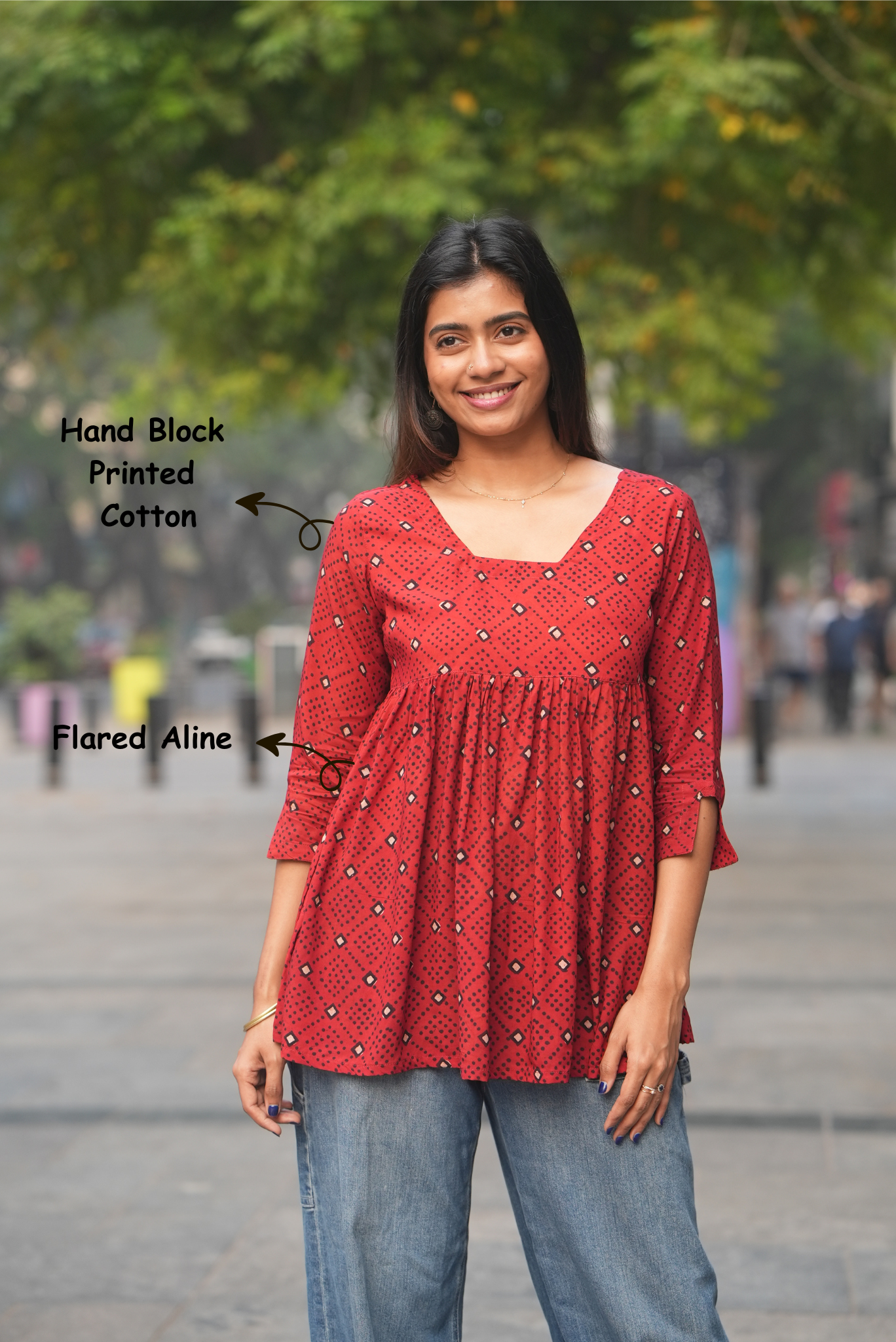 Maroon cotton short kurti with back neck rope detail.Flared maroon cotton short kurti with hand block print design.Women’s maroon hand block printed cotton A-line short top.