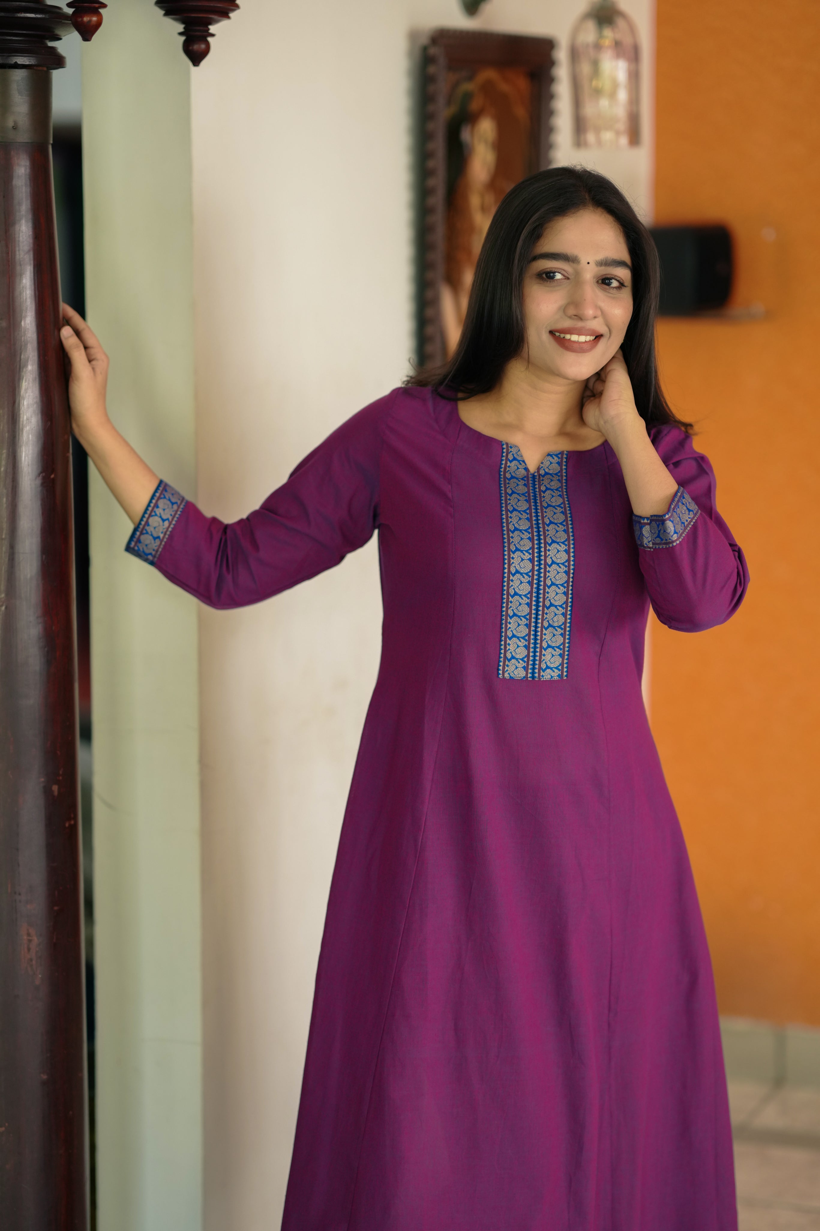 plum cotton kurti for office
elegant a-line kurti for office wear
formal south cotton kurti with side slit
professional cotton kurti set
simple office wear kurti