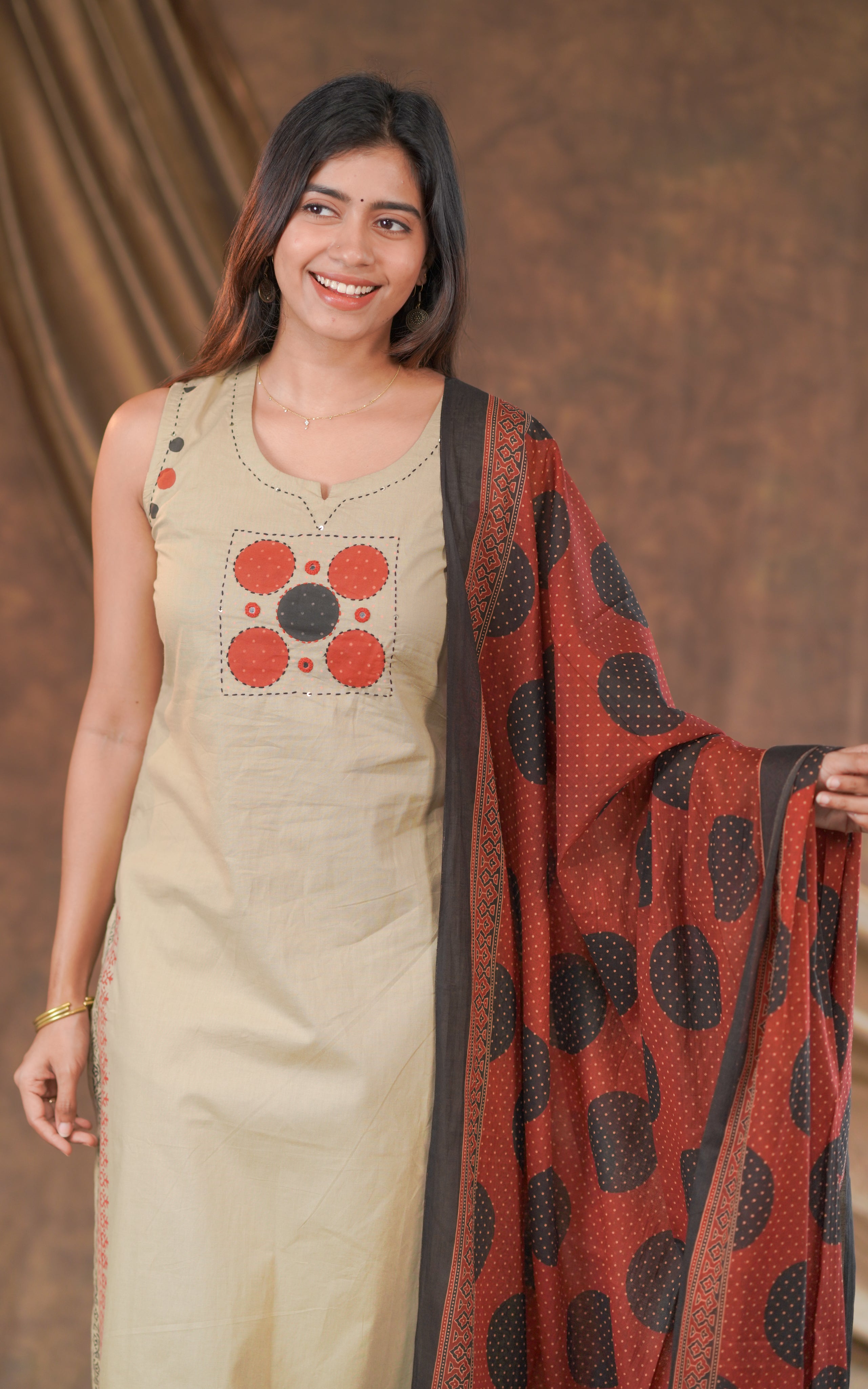 Sleeveless straight cut kurti sets