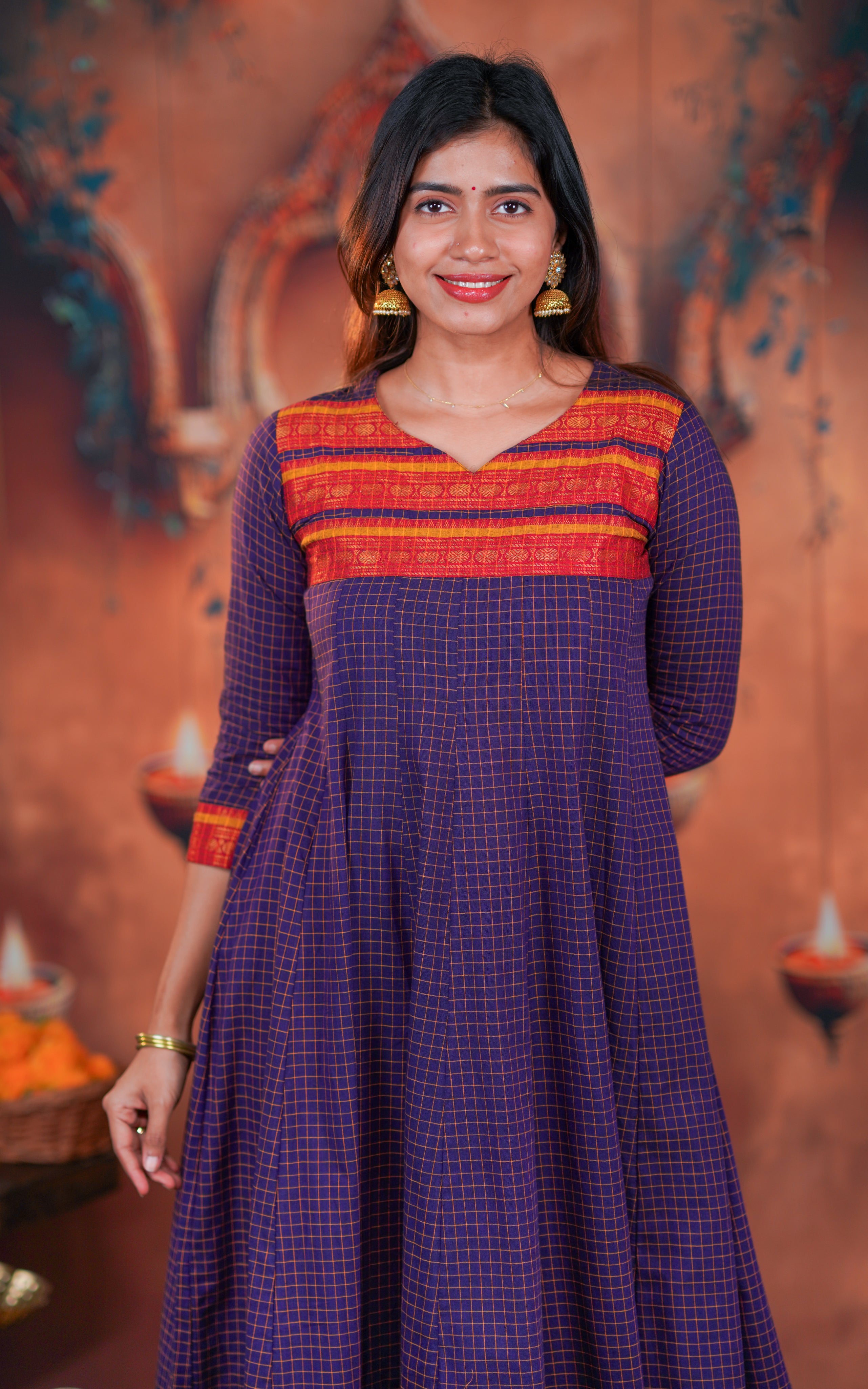 neckline features a stylish contrast red and orange patterned yoke for a rich designer finish