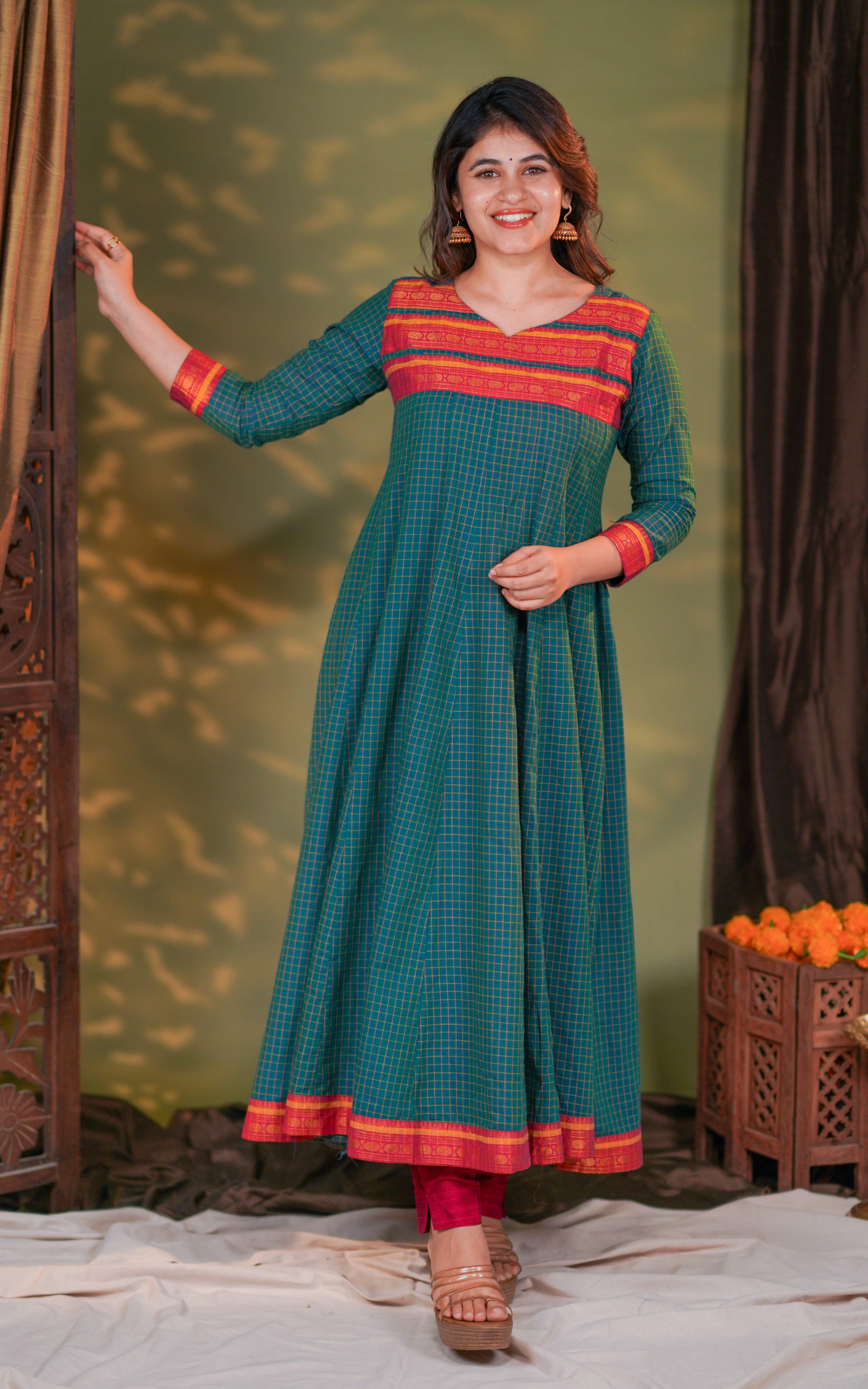 teal checked cotton Anarkali kurti with vibrant red and orange detailing