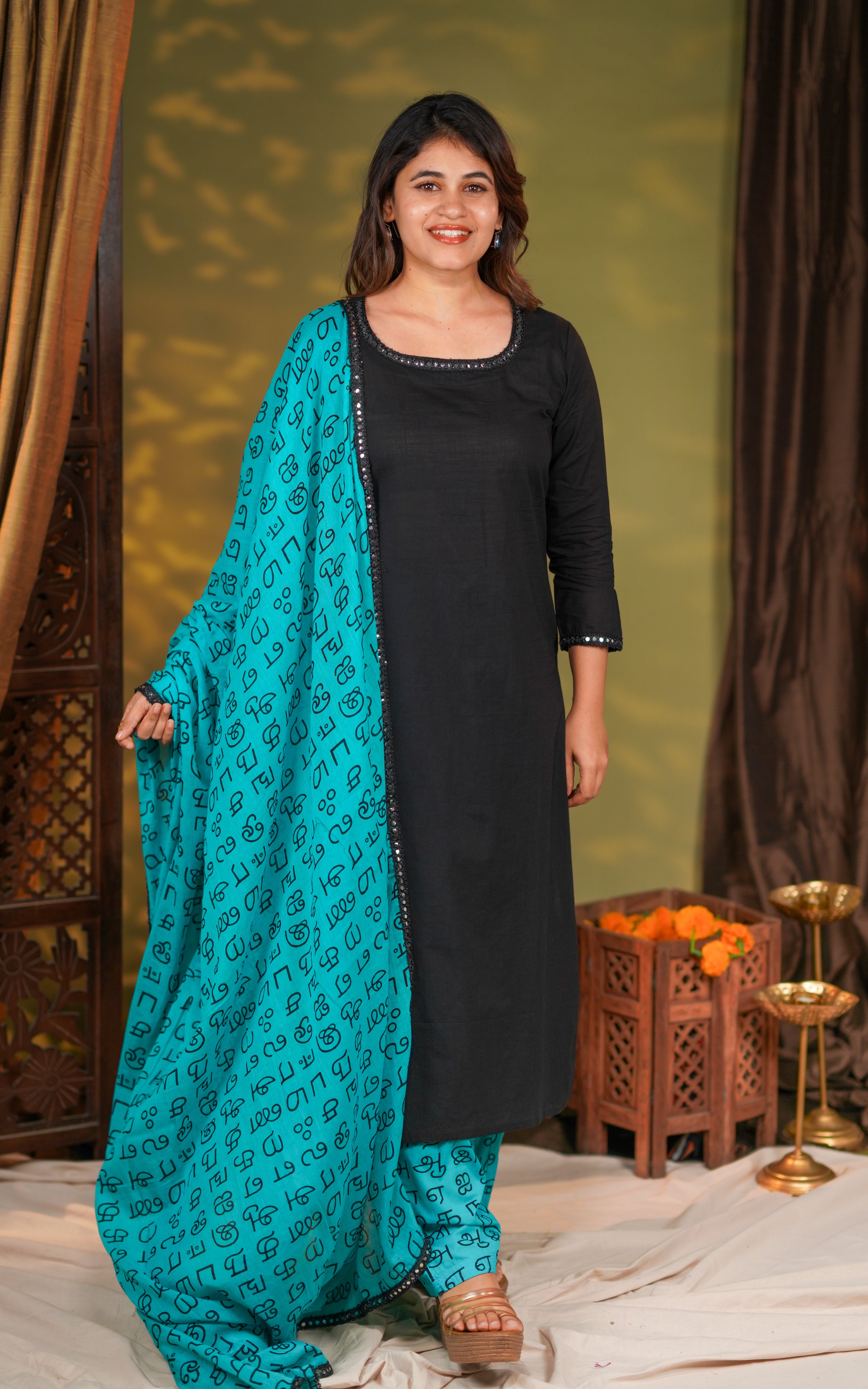 Artistic Tamil-script design reimagined from Nayanthara’s movie-inspired ethnic wear.