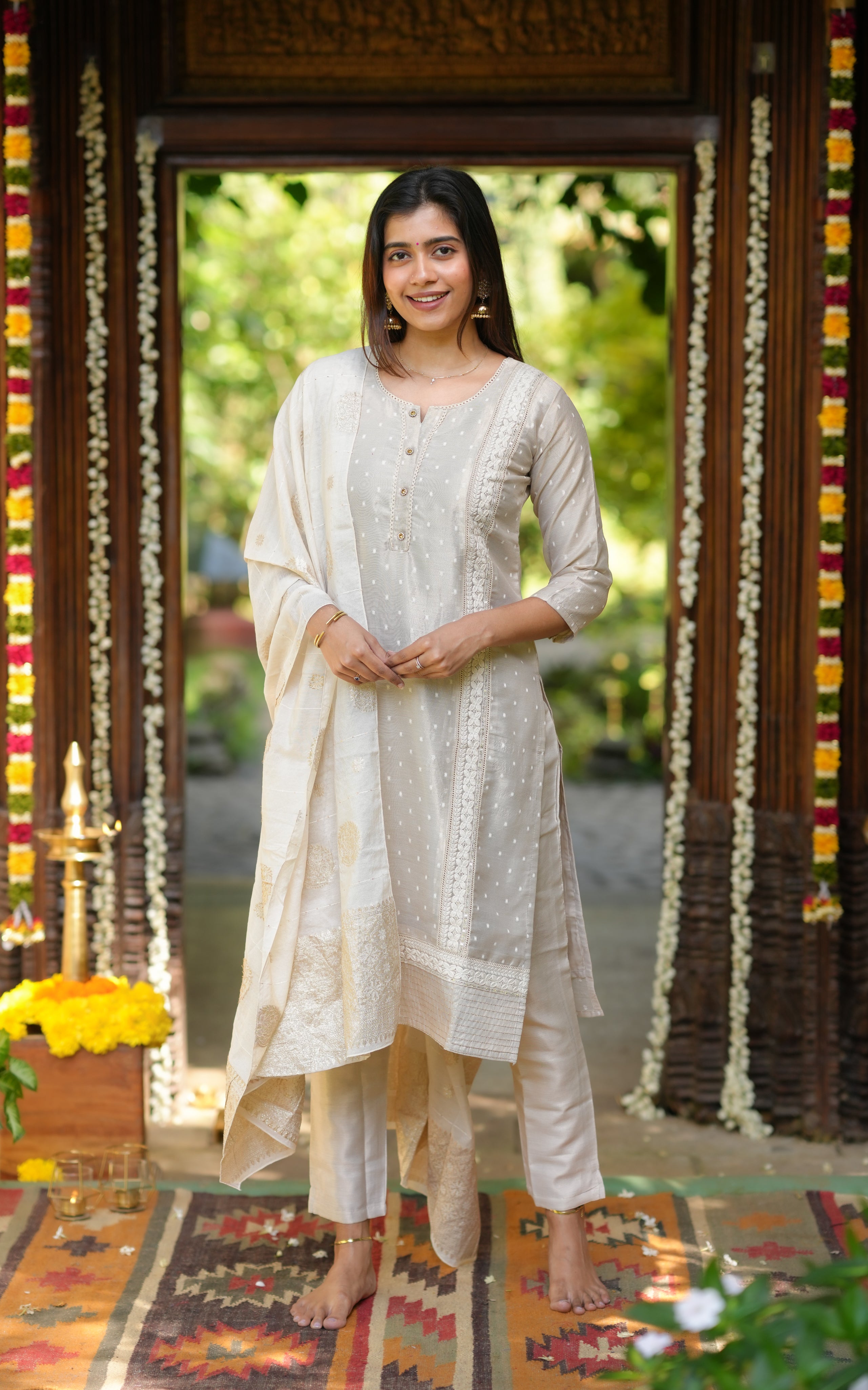  A complete festive look with straight kurti, matching pants, and a beautiful dupatta.
