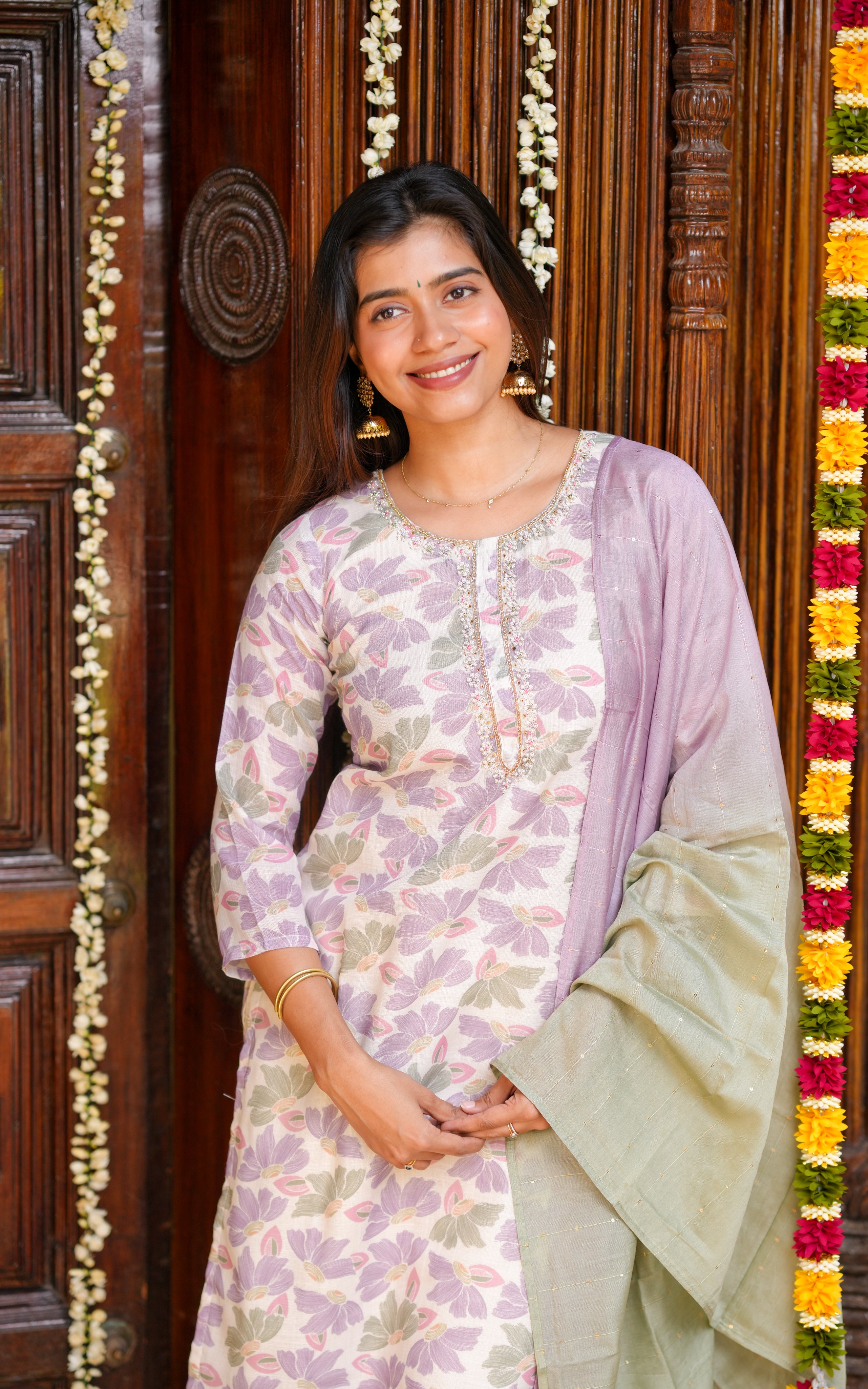  A complete festive look with straight kurti, matching pants, and a beautiful dupatta.
