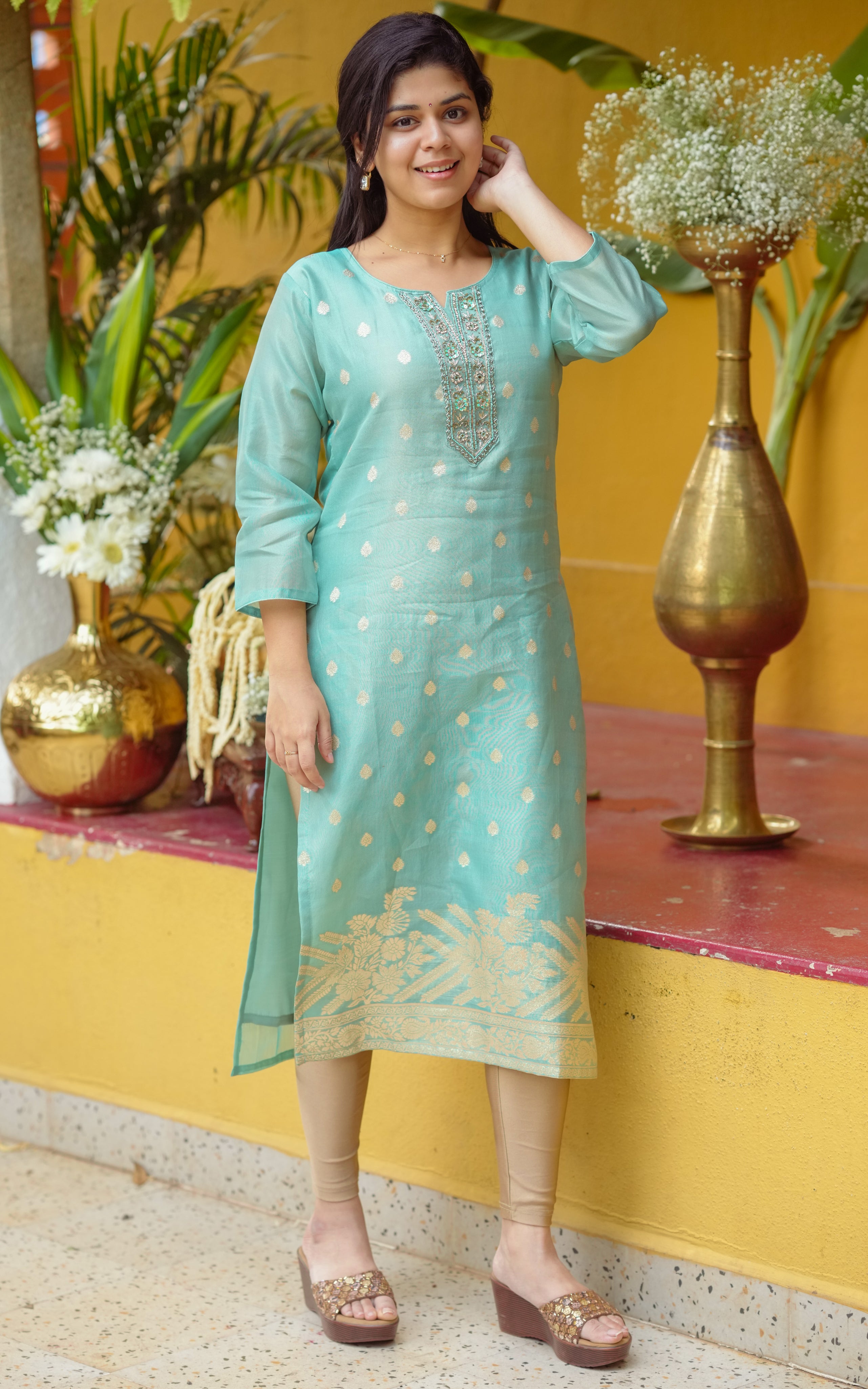 Instore - Pastel Green Color Art Silk Straight Cut Kurti with Embroidered and Zari Butta Detailing with Butter Crepe Lining