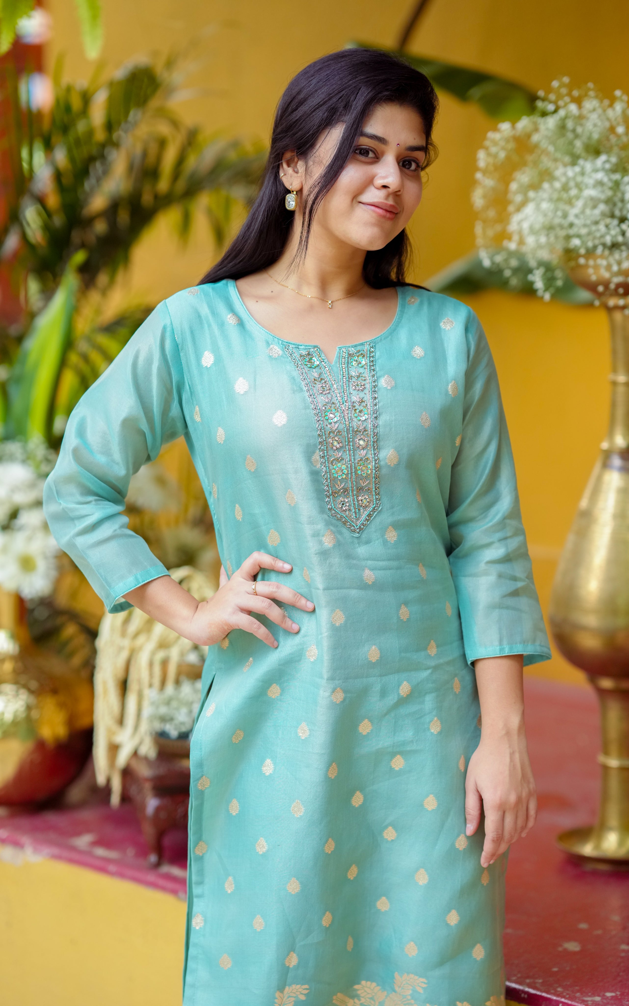 Instore - Pastel Green Color Art Silk Straight Cut Kurti with Embroidered and Zari Butta Detailing with Butter Crepe Lining