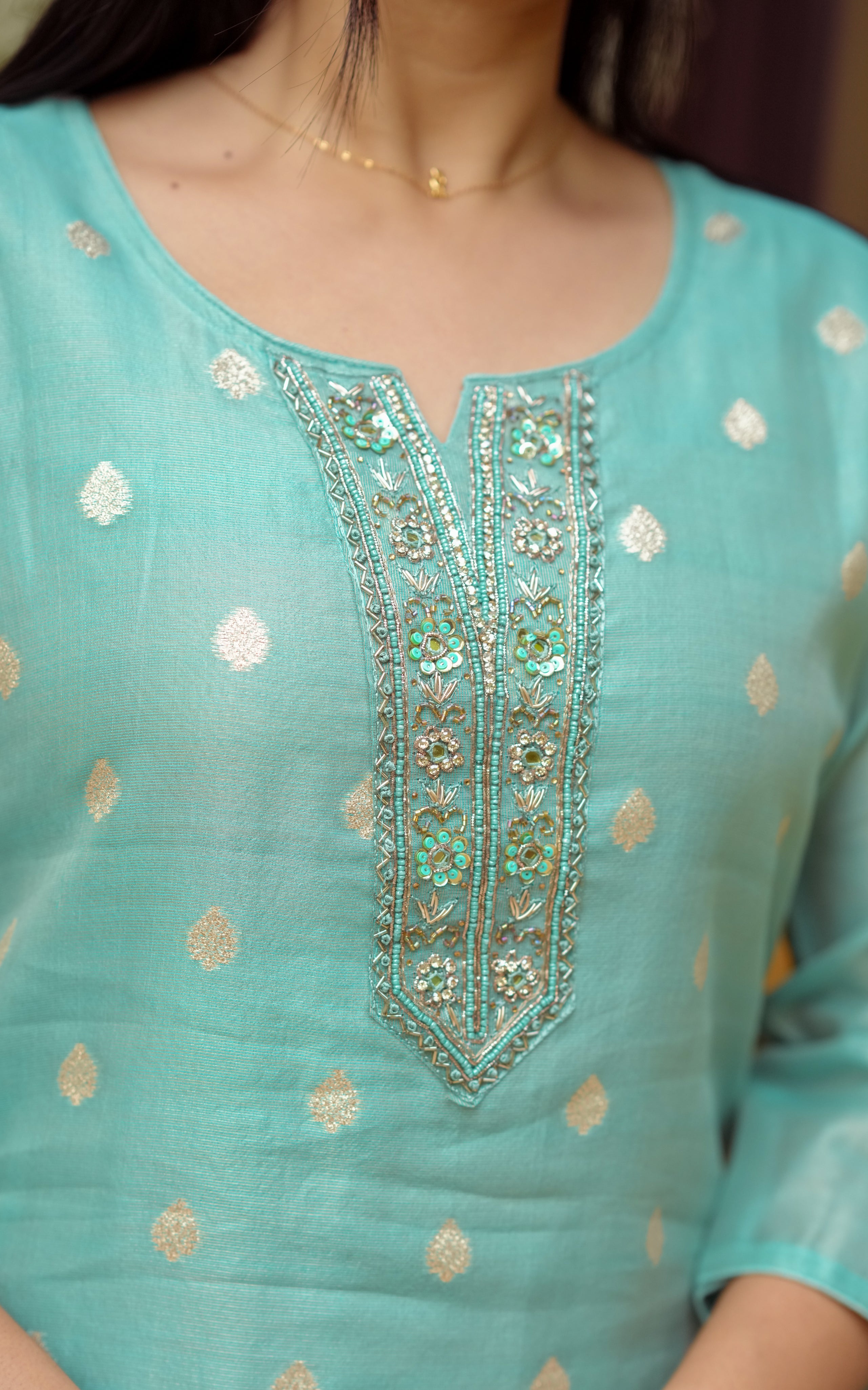 Instore - Pastel Green Color Art Silk Straight Cut Kurti with Embroidered and Zari Butta Detailing with Butter Crepe Lining