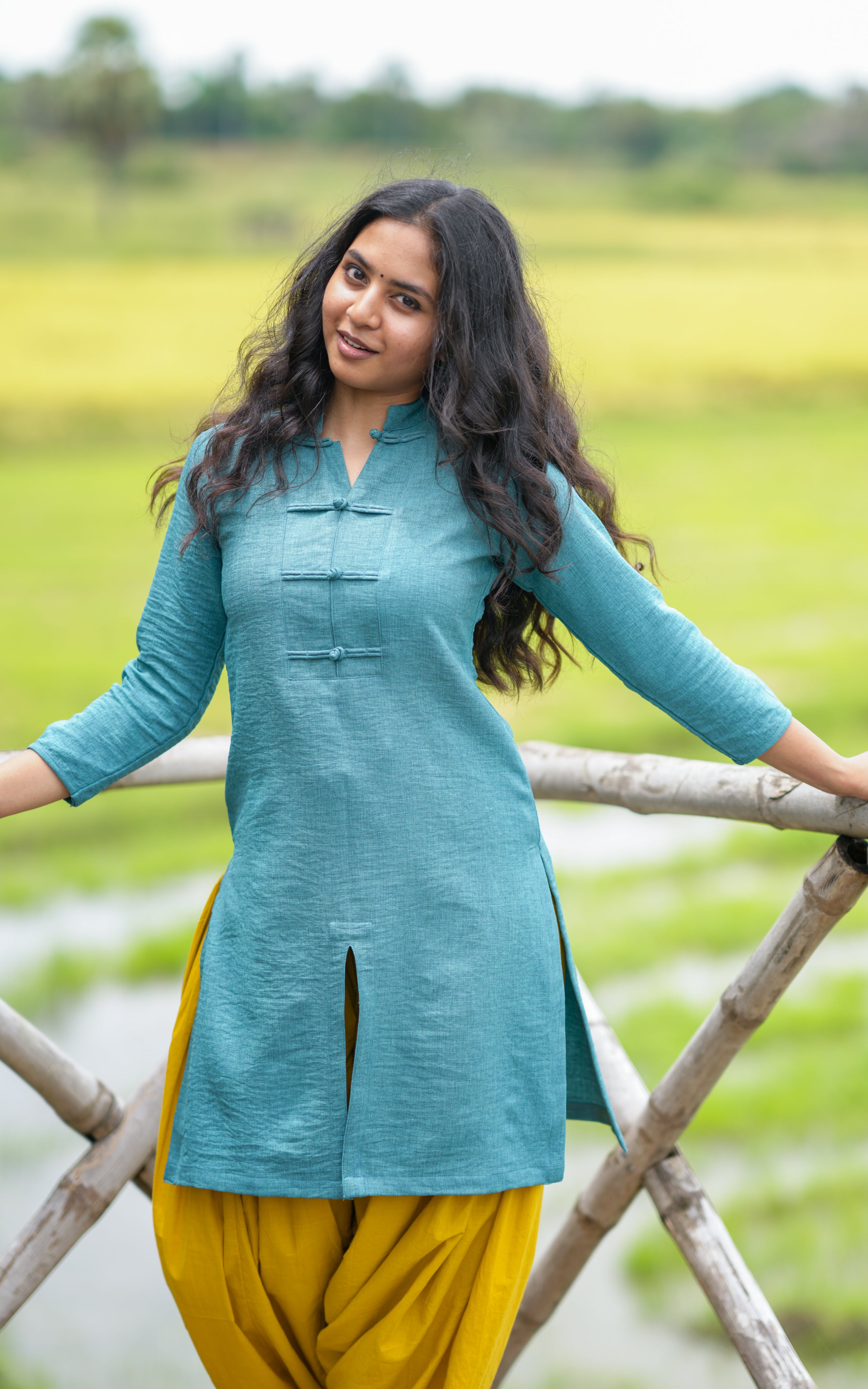 Inspired kurti look from Bhavana’s outfit in Jayam Kondan’s Suttri Varum Boomi song, styled with dhoti pants