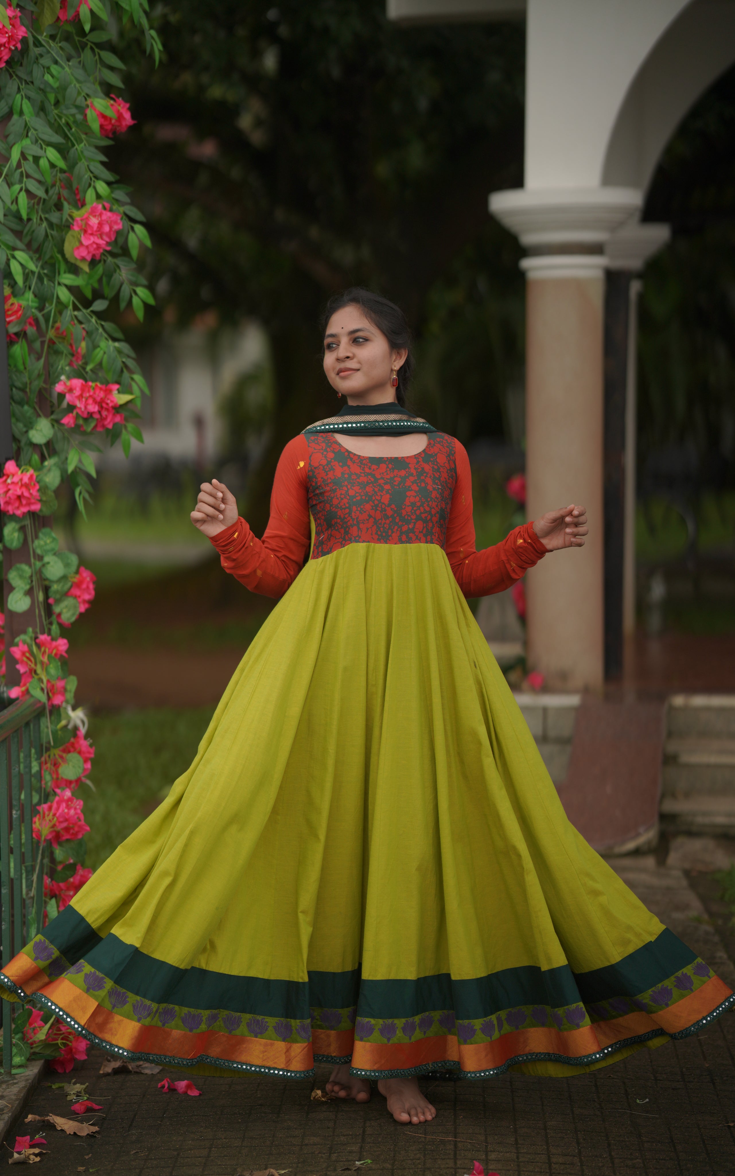Raavanan movie inspired green and orange Anarkali dress